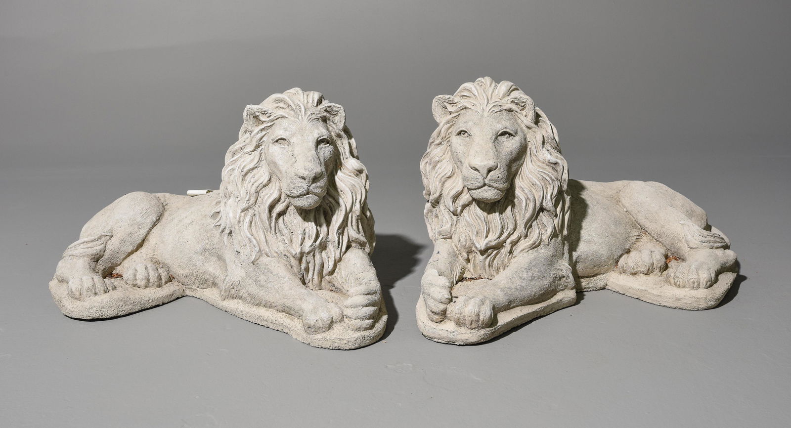 Pair of Small Cast Stone Recumbent Lions (1 of 4)