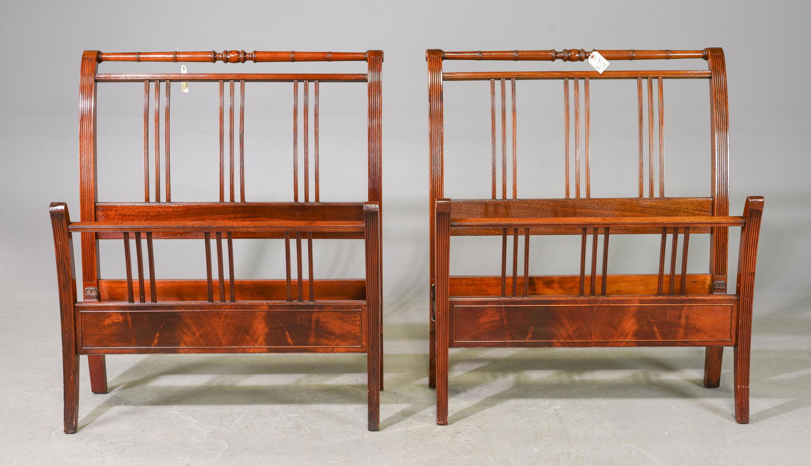 2 American Mahogany Twin Beds with Metal Rails: 2 American Mahogany Twin Beds with Metal Rails - Headboards 43 in tall x 36 x 11 each, Footboards are 27 in tall x 36 x 7 each -