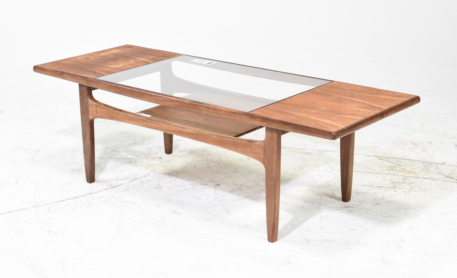 G-Plan Fresco Coffee Table as seen in Mad Men: This Danish Modern Style teak coffee table is British and made by British Mid Century Modern Furniture Maker G Plan (GPlan). This model table was featured in the Mid Century Modern office of Don Drape