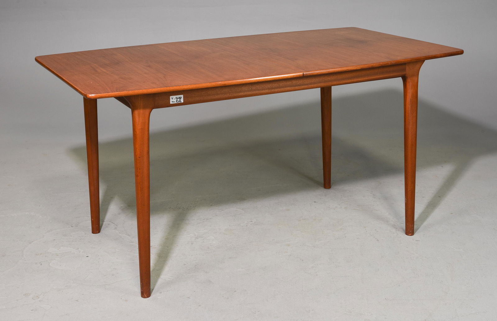 Mid Century Modern Table with Pop Up Leaf - McIntosh: Danish Modern Style Teak Dining Table with Pop Up Leaf by McIntosh - 29 in tall x 58 x 33, Leaf adds an additional 18 inches, Floor to apron is 25 inches