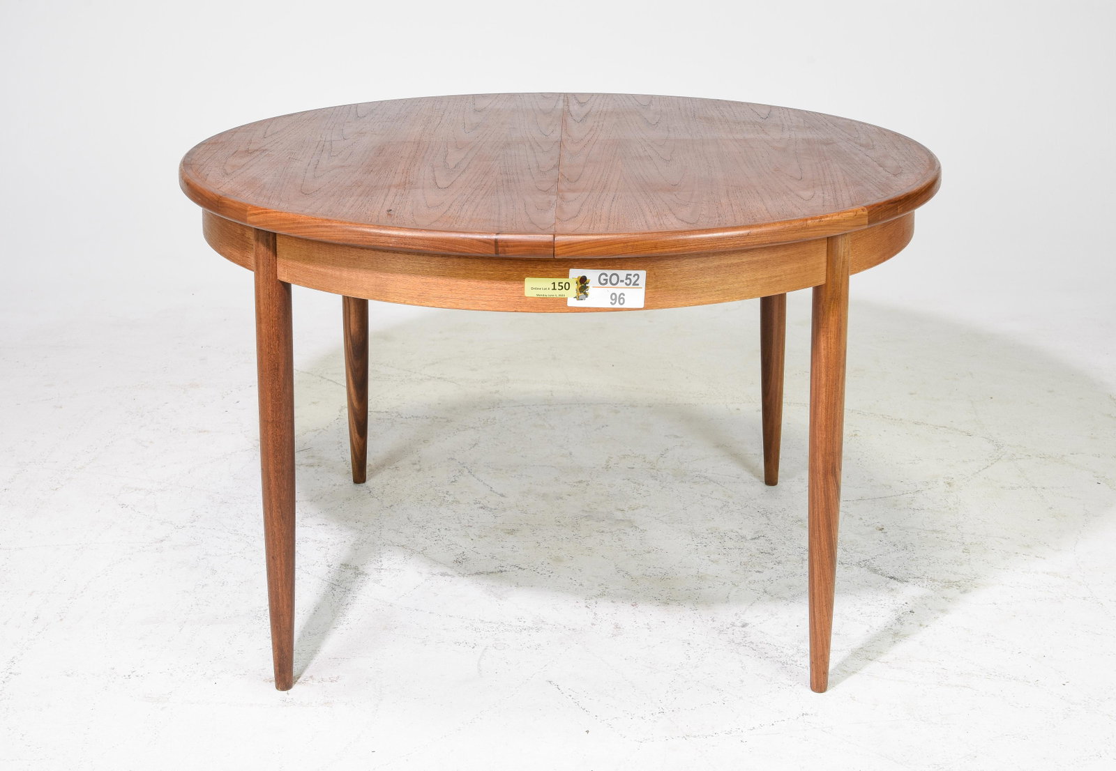 Round Mid Century Table By G-Plan - Pop Up Leaf: This Danish Modern Style Teak Dining Table includes a pop-out butterfly style leaf & is made by Mid Century Modern Furniture Maker G Plan ( Gplan ) - Part of their Fresco Range. - 29 in tall x 48 inch