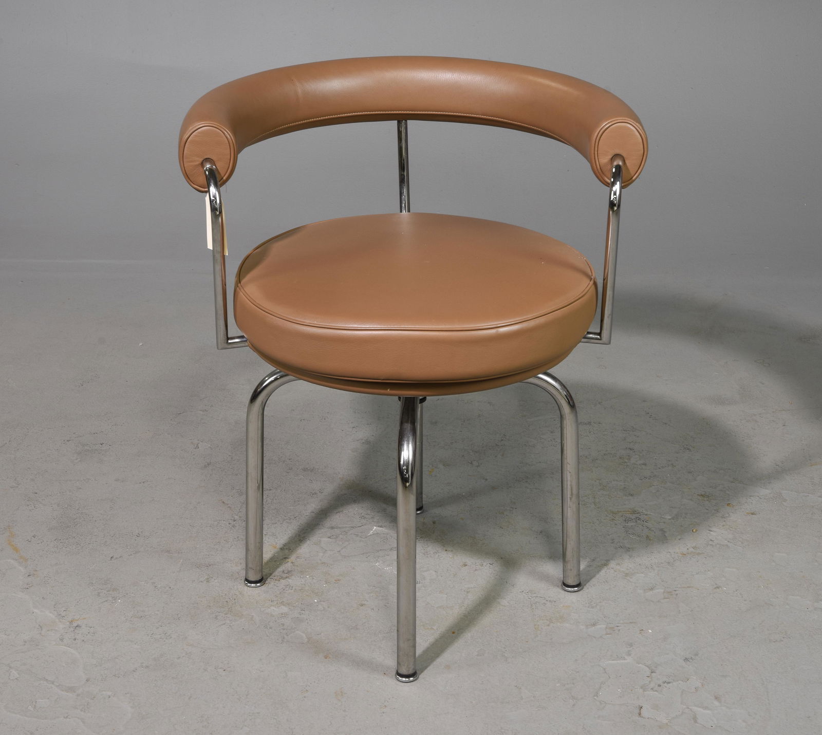 Le Corbusier Mocha Swivel Chair: Le Corbusier Mocha Swivel Chair - 28.5 in tall x 25 x 22, Seat height is 19.5 inches