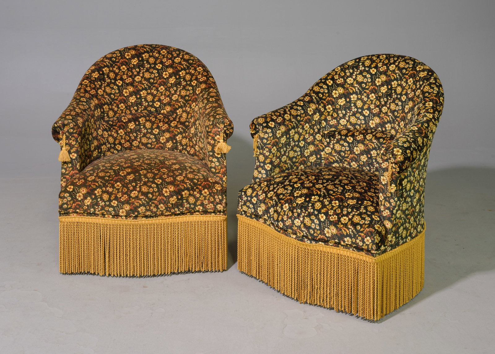 2 French Floral Upholstered Crapeau Chairs: 2 French Floral Upholstered Crapeau Chairs with Fringed Skirts - 31 in tall x 26.5 x 25 each with a seat height of 14 inches