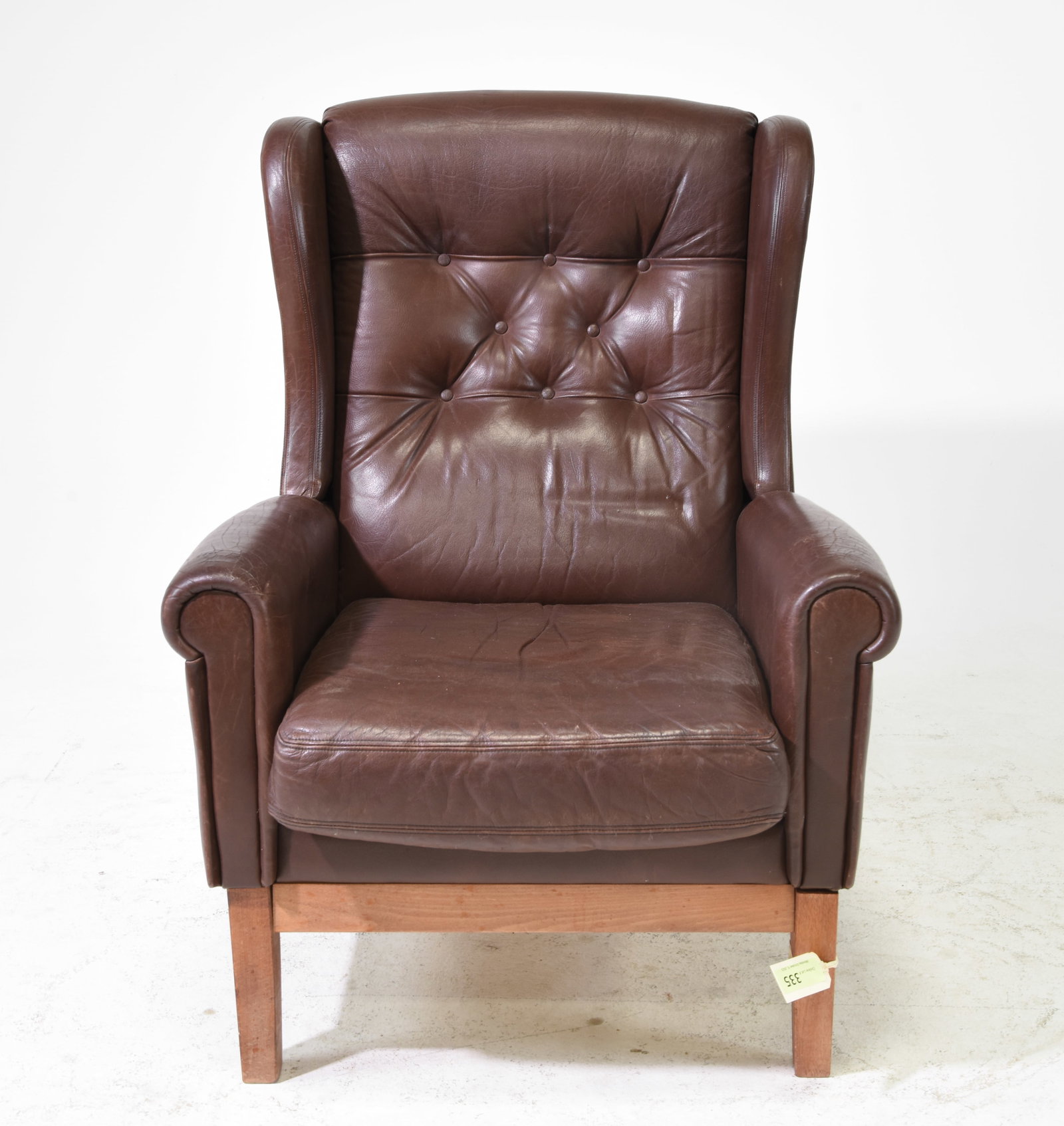 Brown Leather Wing Back Arm Chair: Brown Leather Wing Back Arm Chair- 42 inches tall x 32 x 37, seat height is 18 inches