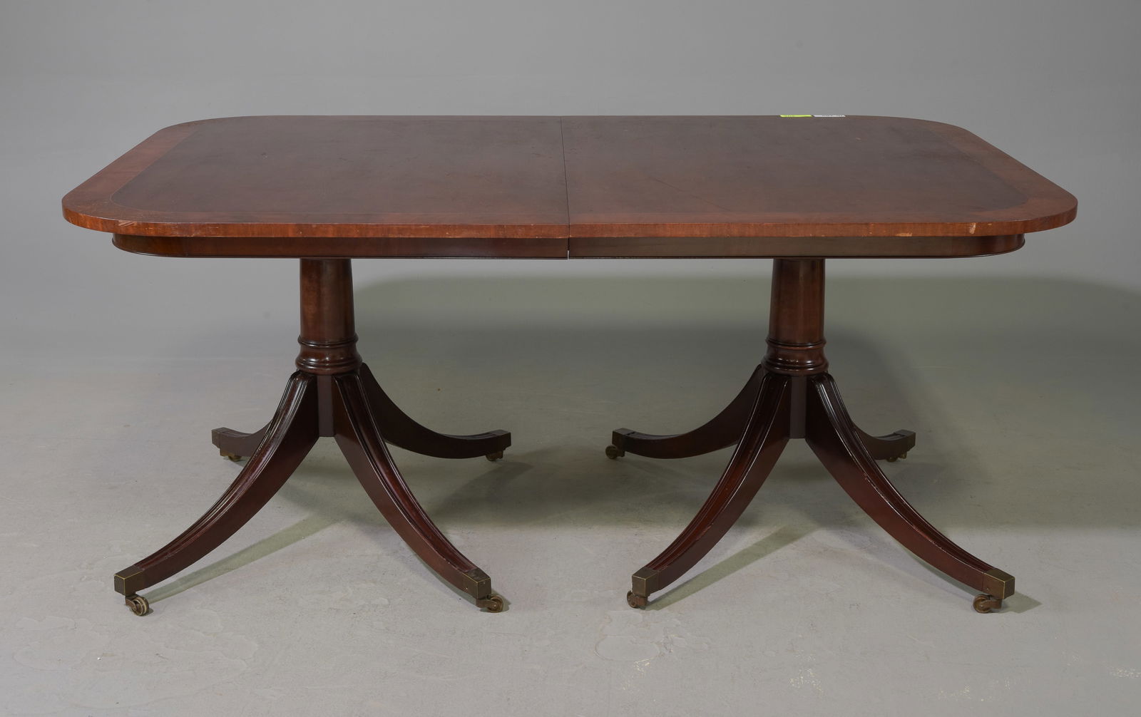Duncan Phyfe Style Mahogany Pedestal Base Table: Duncan Phyfe Style Mahogany Double Pedestal Base Table with Three Insertable Leaves - 29 in tall x 66 x 46, Leaves add an additional 26 inches each, Floor to under is 26.75 inches