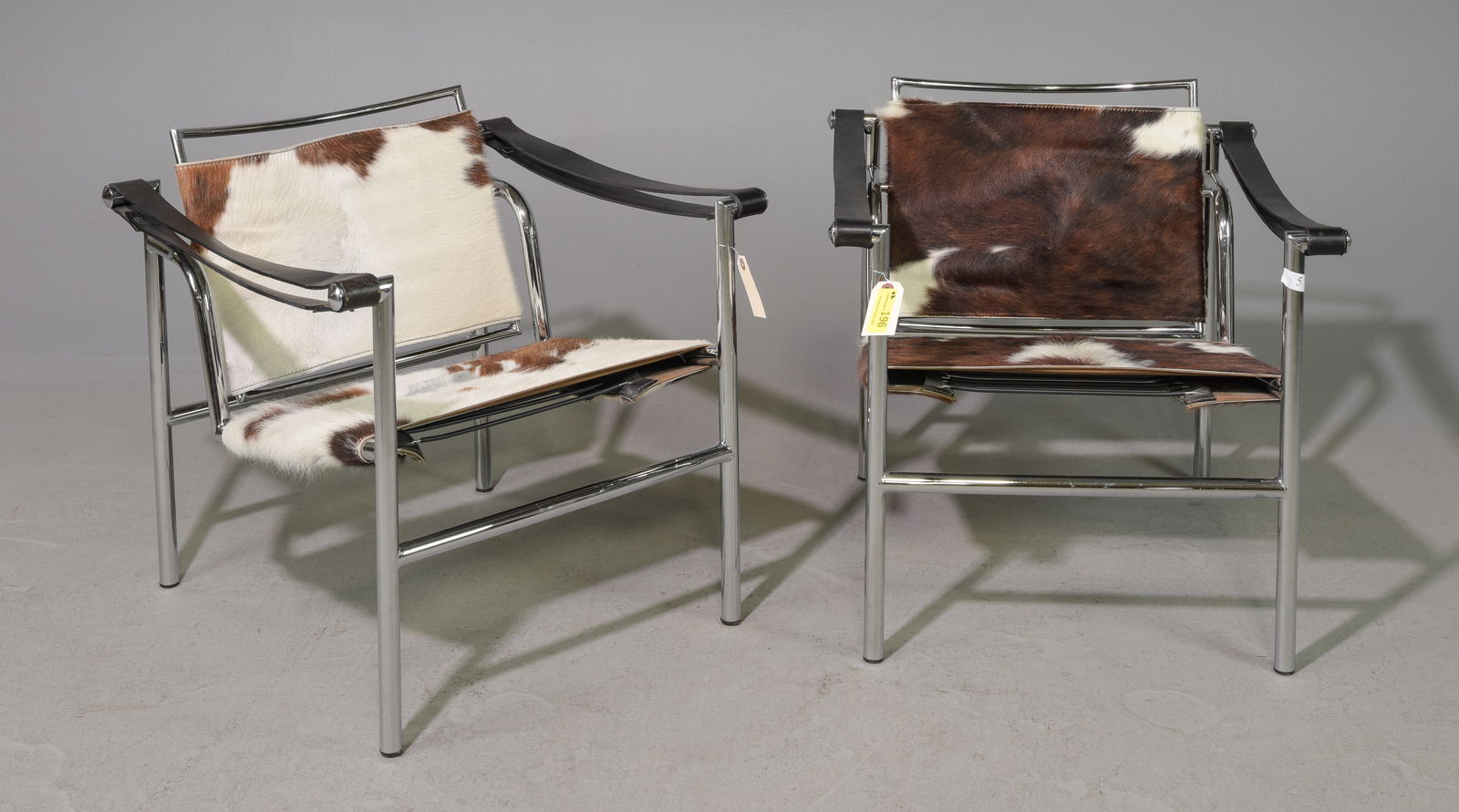 2 Le Corbusier Style Hide Upholstered Arm Chairs (1 of 6)