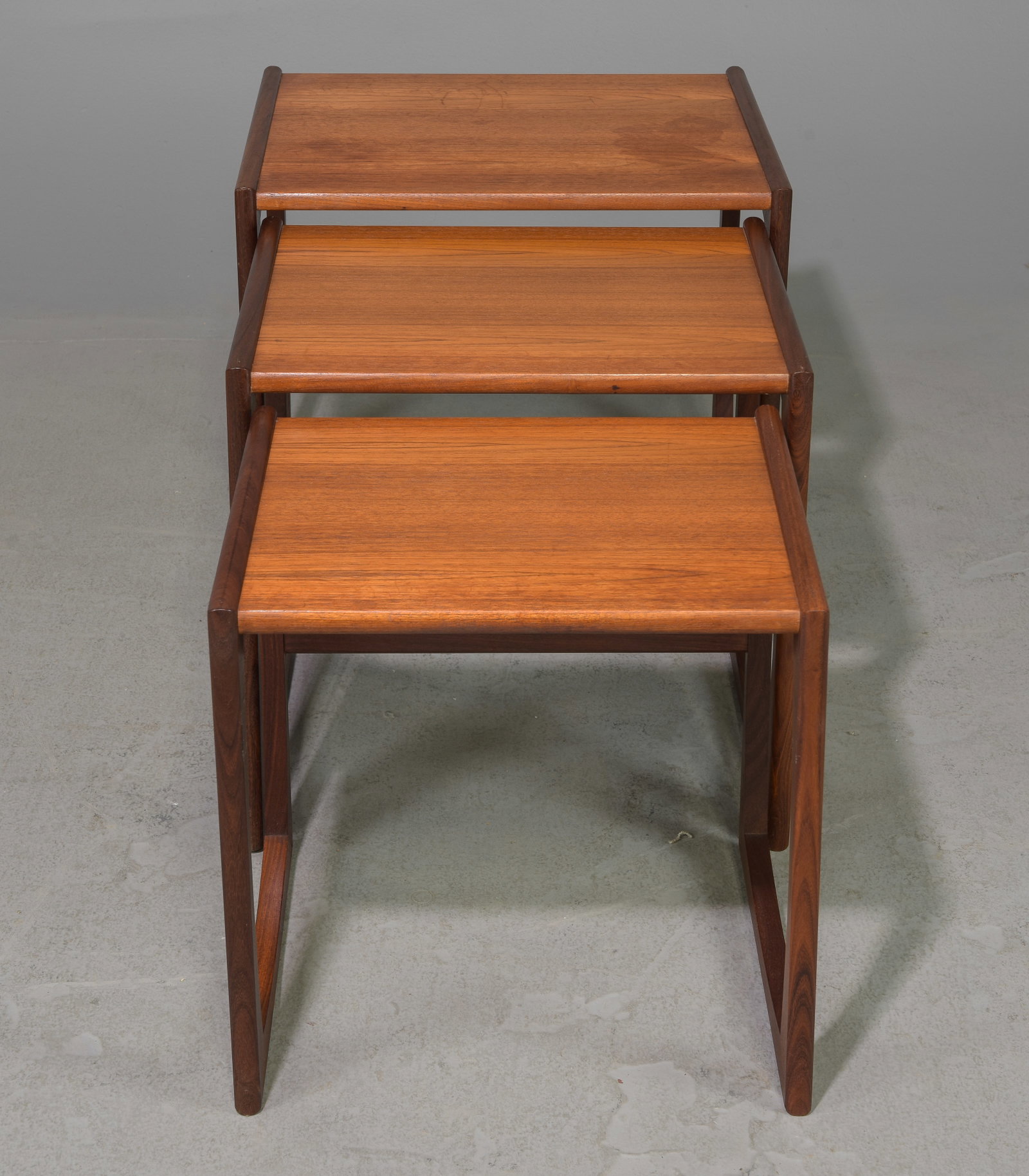 Mid Century Modern Quadrille Nest of 3 Tables: This Danish Modern Style Nest is British and made by Mid Century Modern Furniture Maker G Plan ( Gplan ) it stacks to make a bookcase as well. Measurement for largest table is 19 in tall x 21 wide x 1