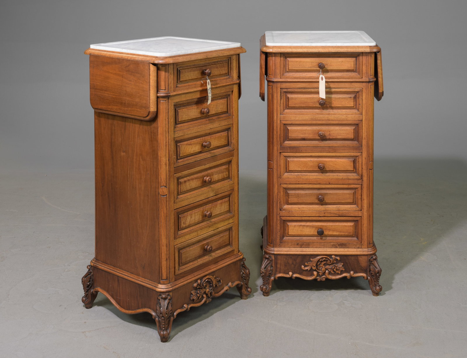 Pair Of Louis XV Style White Marble Top Nightstands: Pair Of French Louis XV Style White Marble Top Nightstands / Occasional Chests with Drop Sides - 37.5 inches tall x 18 x 17