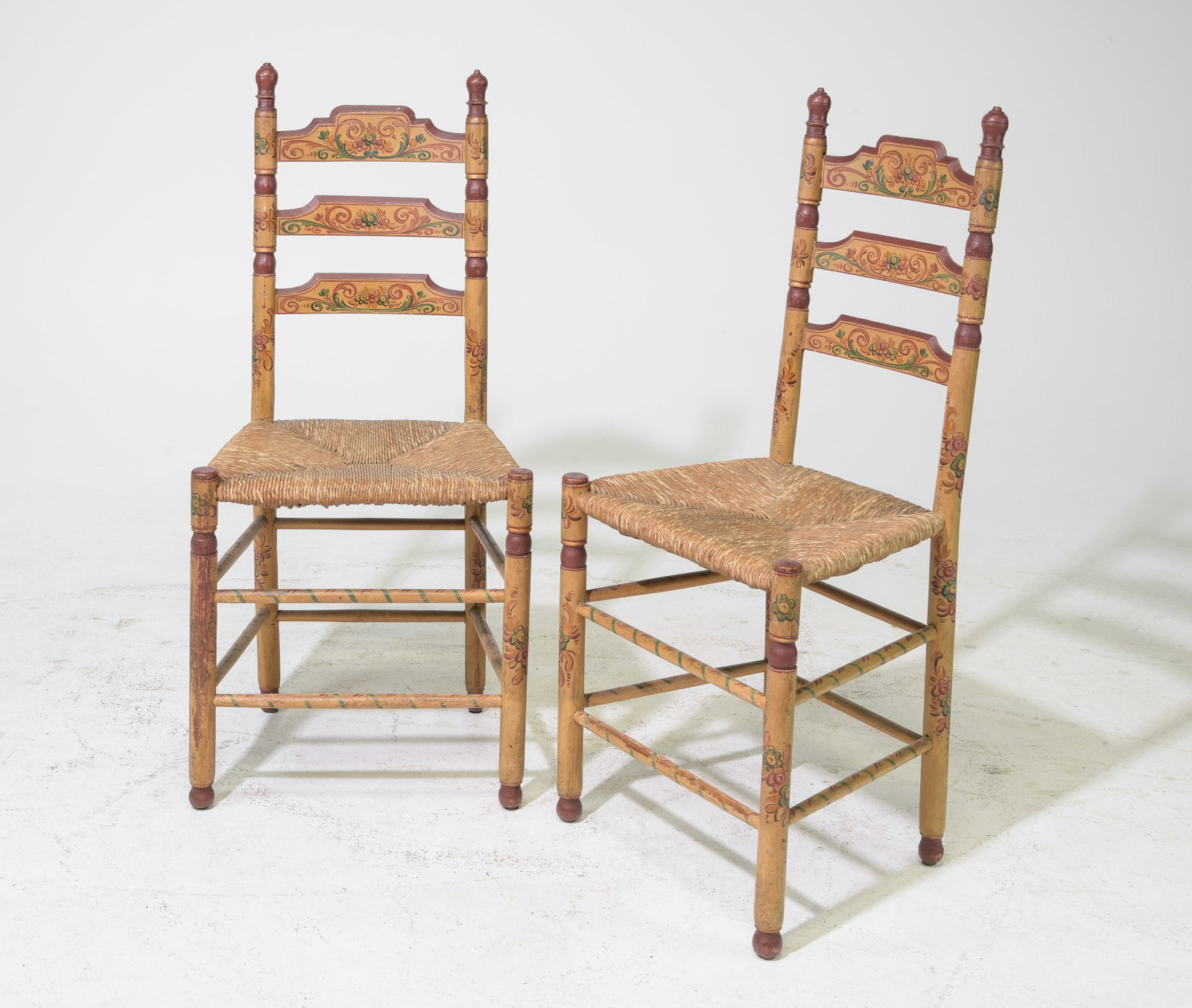 2 French Country Rush Seat Ladderback Chairs: 2 French Country Rush Seat Ladderback Chairs With Floral Painted Backrest - 41 inches tall x 19 x 18, seat height is 19 inches