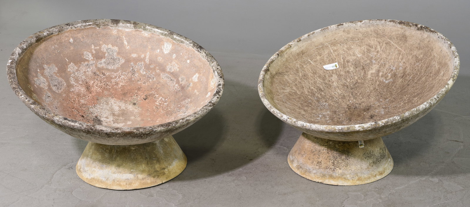 2 Willy Guhl Saucer Planters on Stands: 2 Willy Guhl Saucer Planters on Stands - 15 in tall x 32 inch diameter Much of his work is crafted from either concrete or Eternit. Review photos for different ways they can be positioned