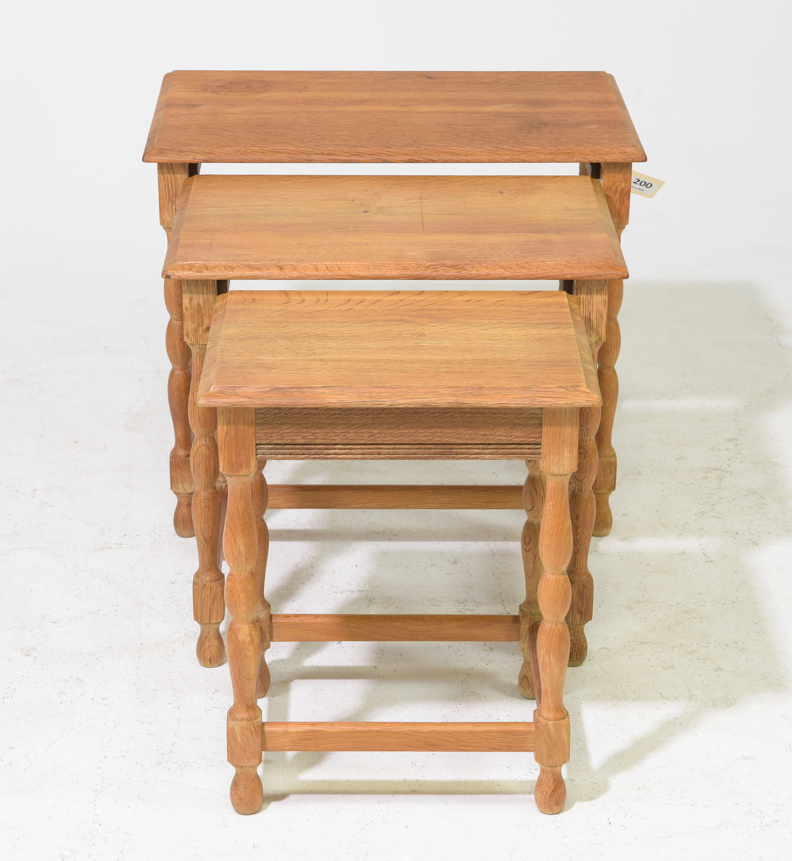 Danish Oak Nest of Three Tables: Danish Oak Nest of Three Tables - 19.5 in tall x 23.25 x 15, 18.5 in tall x 19 x 13.5 and 17.75 in tall x 14.75 x 12.25 Similar in style to / possibly by : S. Thrane & Son / Henning Kjaernulf / Guille