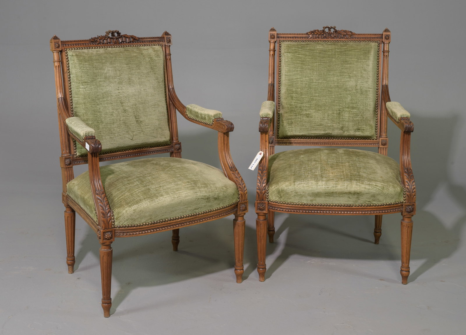Pair of Louis XVI Style Walnut Arm Chairs: Pair of French Louis XVI Style Walnut Arm Chairs - 37 in tall x 24 x 23, Seat height is 16 inches