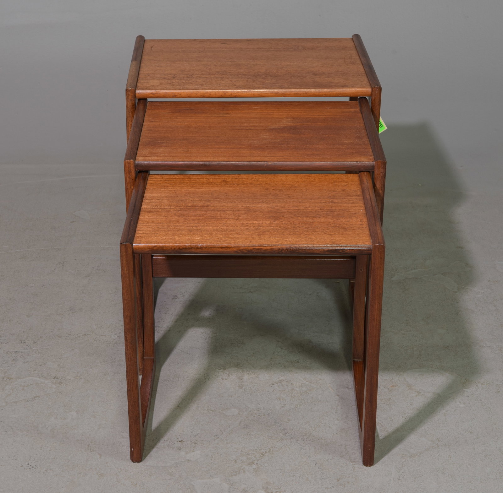 Mid Century Modern Quadrille Nest of 3 Tables: This Danish Modern Style Nest is British and made by Mid Century Modern Furniture Maker G Plan ( Gplan ) it stacks to make a bookcase as well. Measurement for largest table is 19 in tall x 21 wide x 1