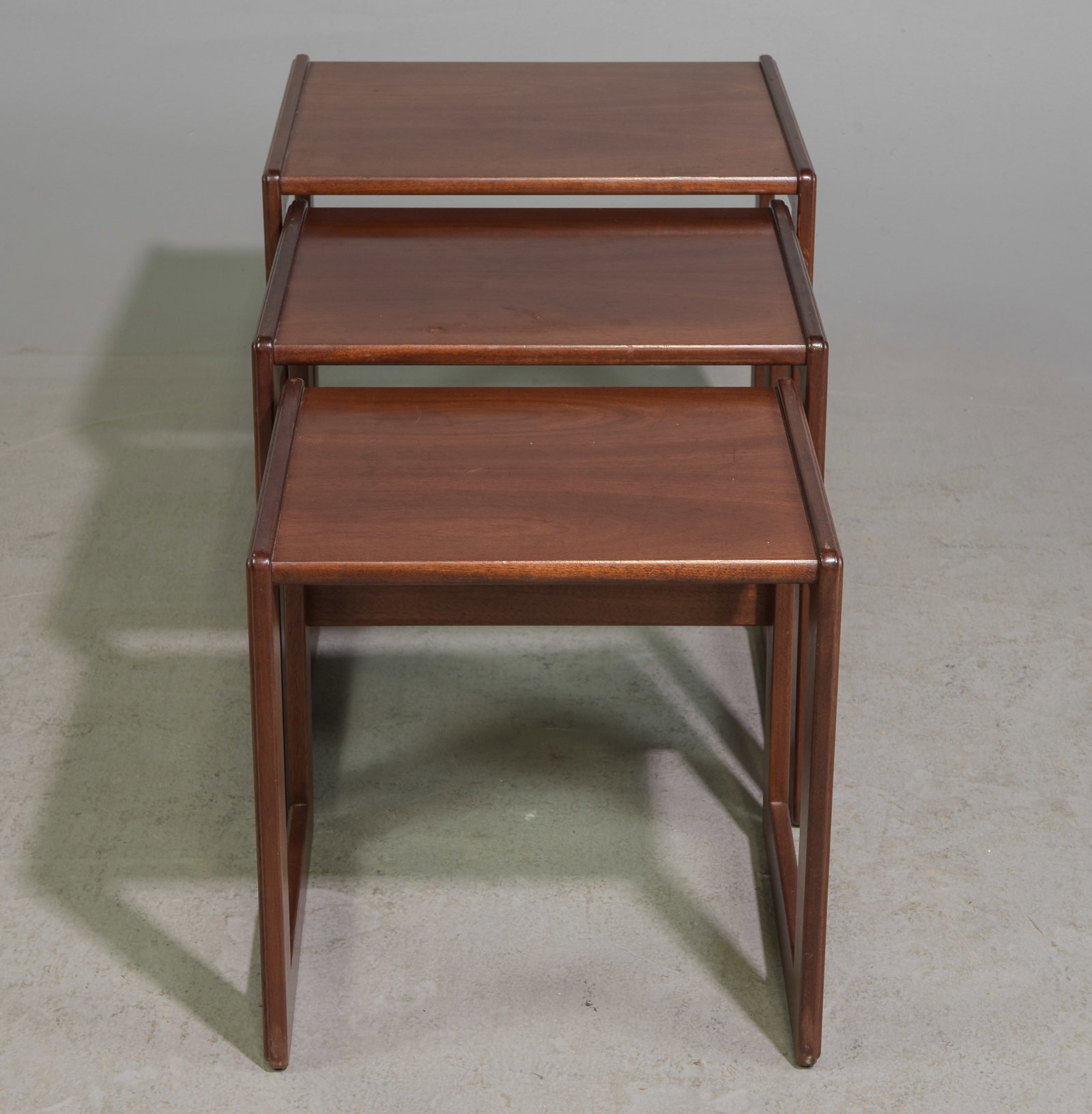 Mid Century Modern Quadrille Nest of 3 Tables: This Danish Modern Style Nest is British and made by Mid Century Modern Furniture Maker G Plan ( Gplan ) it stacks to make a bookcase as well. Measurement for largest table is 19 in tall x 21 wide x 1