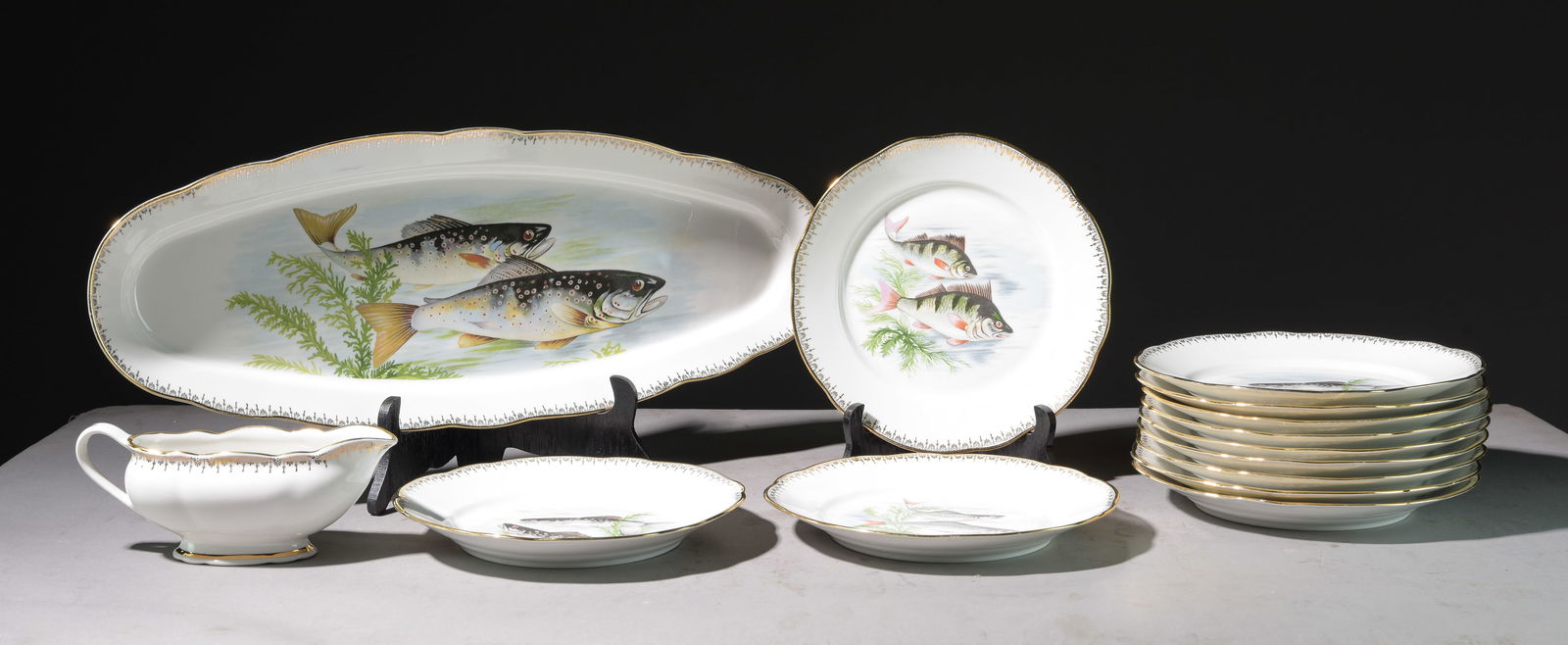 14pc French Fish Plate Set with Gold Rim: 14pc French Fish Plate Set with Gold Rim - Platter, 12 Plates & Sauce Boat - Platter is 1.5 in tall x 22.25 x 8.5