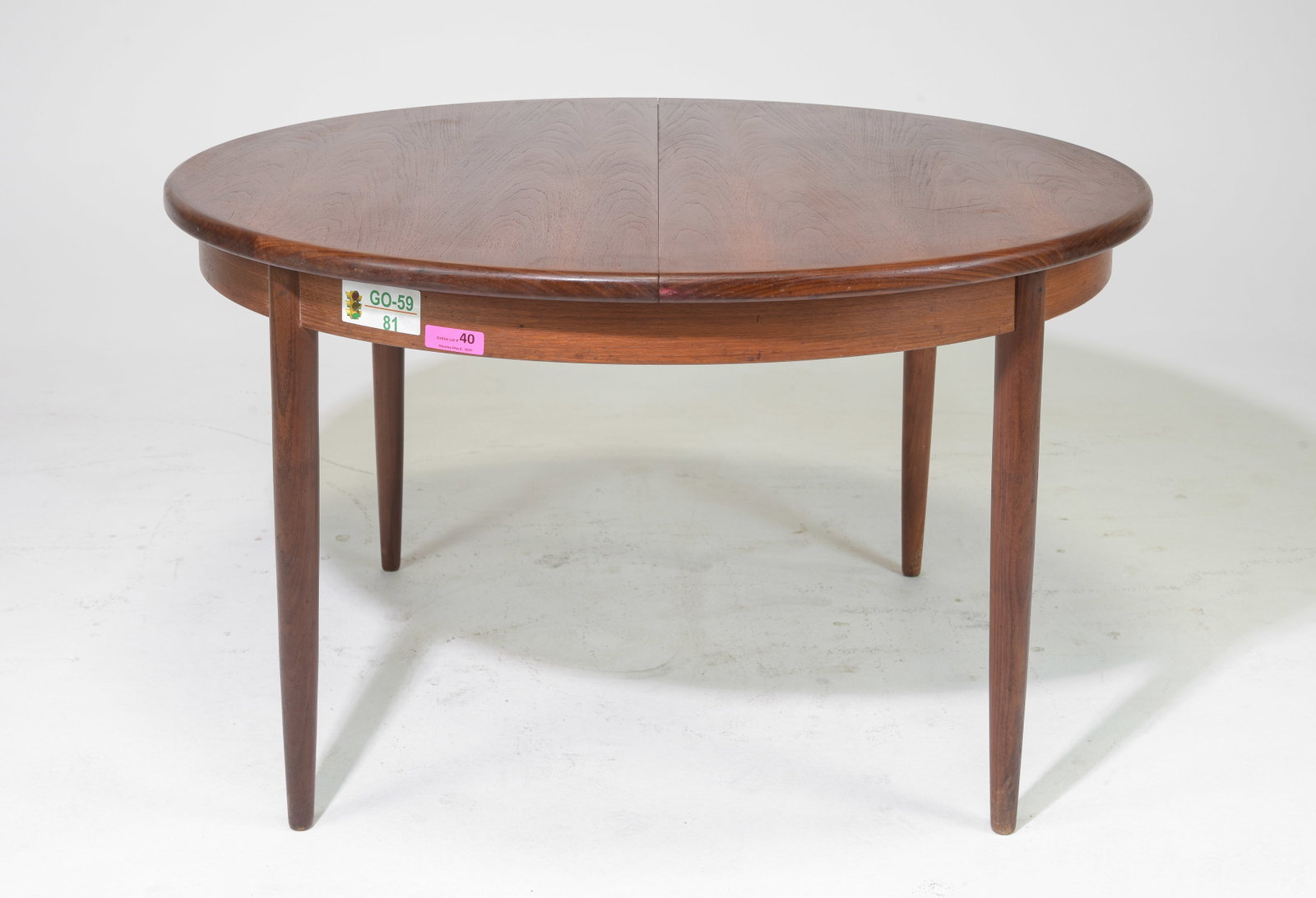 Round Mid Century Table By G-Plan - Pop Up Leaf: This Danish Modern Style Teak Dining Table includes a pop-out butterfly style leaf & is made by Mid Century Modern Furniture Maker G Plan ( GPlan ) - Part of their Fresco Range. - 29 in tall x 48 inch