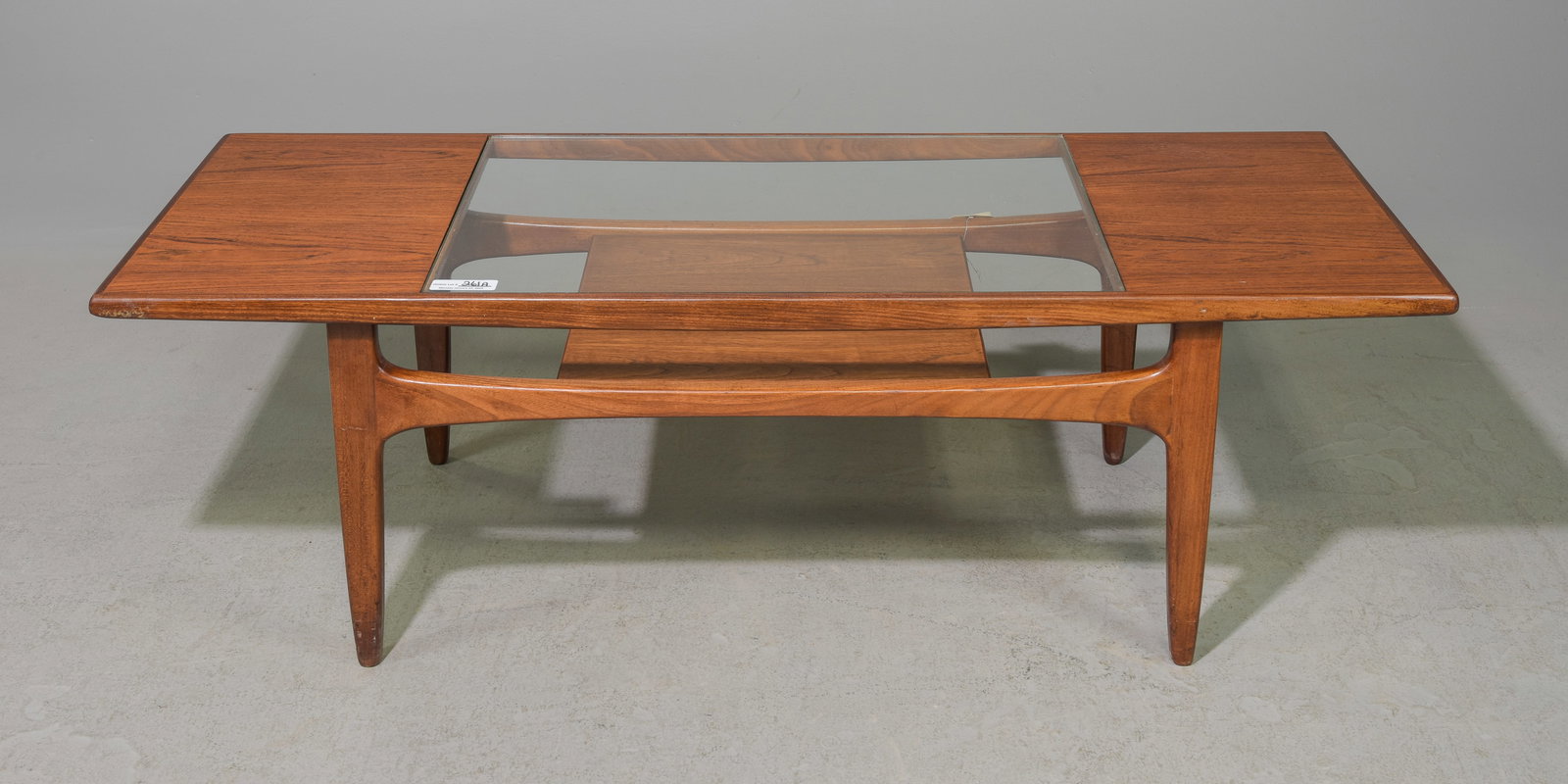 G-Plan Fresco Coffee Table as seen in Mad Men: This Danish Modern Style teak coffee table is British and made by British Mid Century Modern Furniture Maker G Plan (GPlan). This model table was featured in the Mid Century Modern office of Don Drape