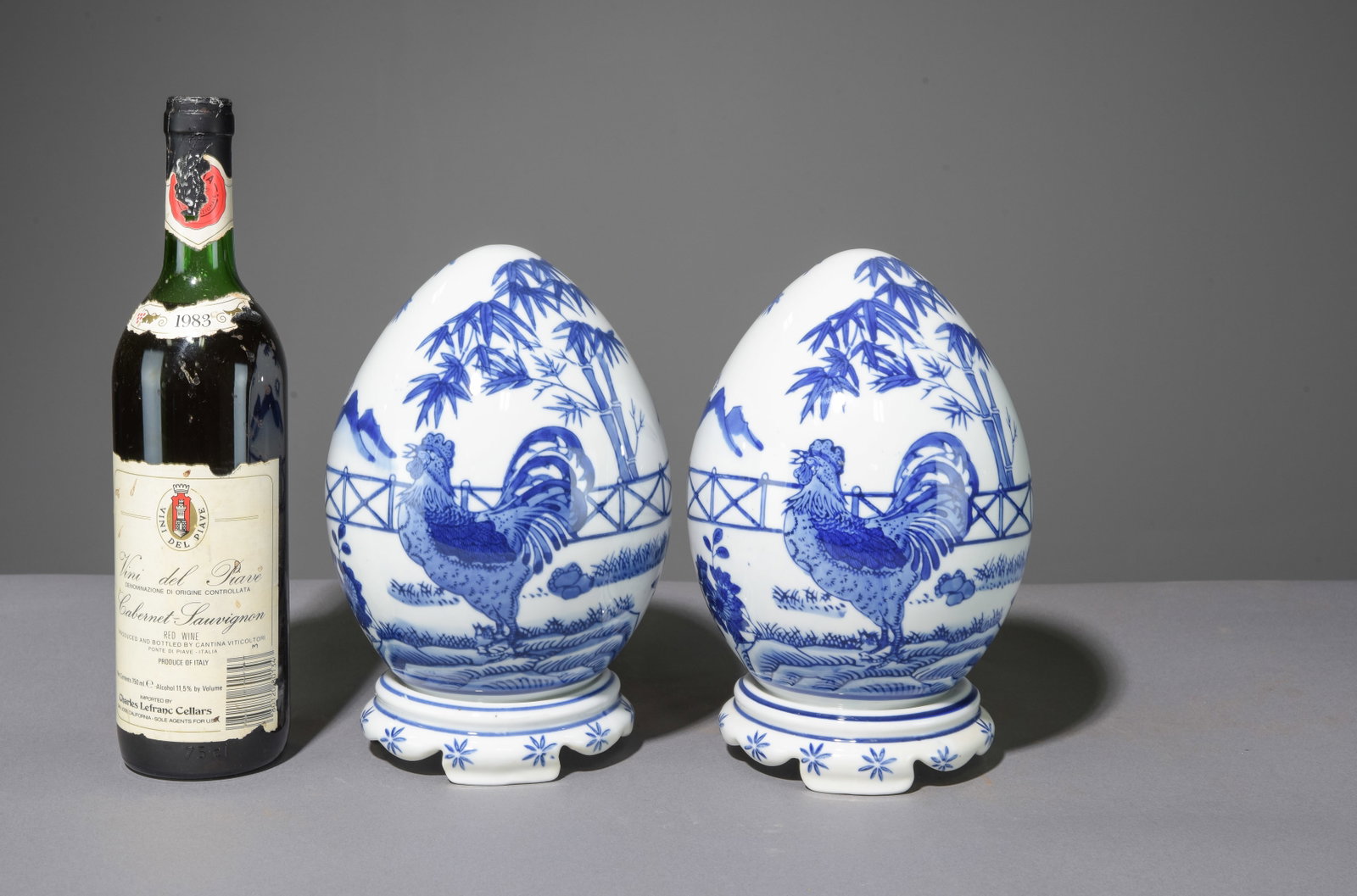Two Blue & White Rooster Porcelain Eggs: Two Blue & White Rooster Porcelain Eggs - 9.25 in tall x 6 inch diameter each