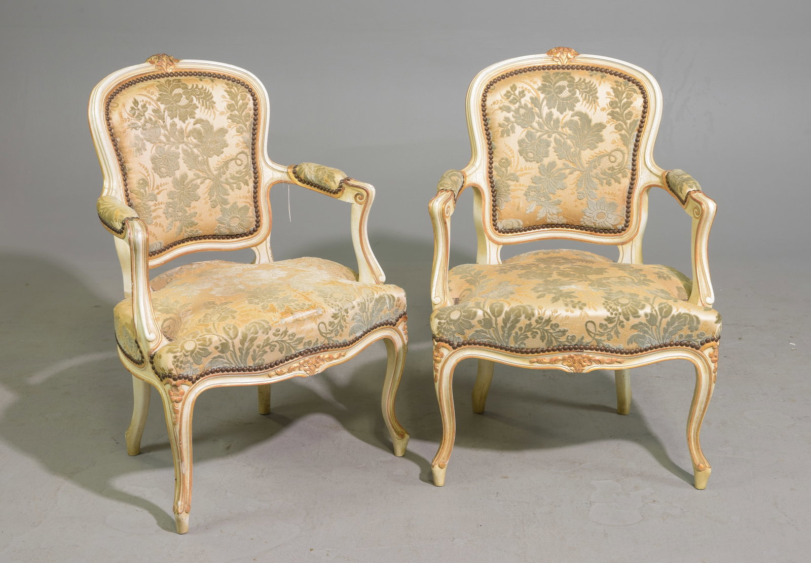 Pair of Louis XV Style Painted Bergere Arm Chairs: Pair of French Louis XV Style Painted Bergere Arm Chairs with Foliate Upholstery c.1920's-30's - 34 in tall x 24 x 20 each with a seat height of 16 inches each