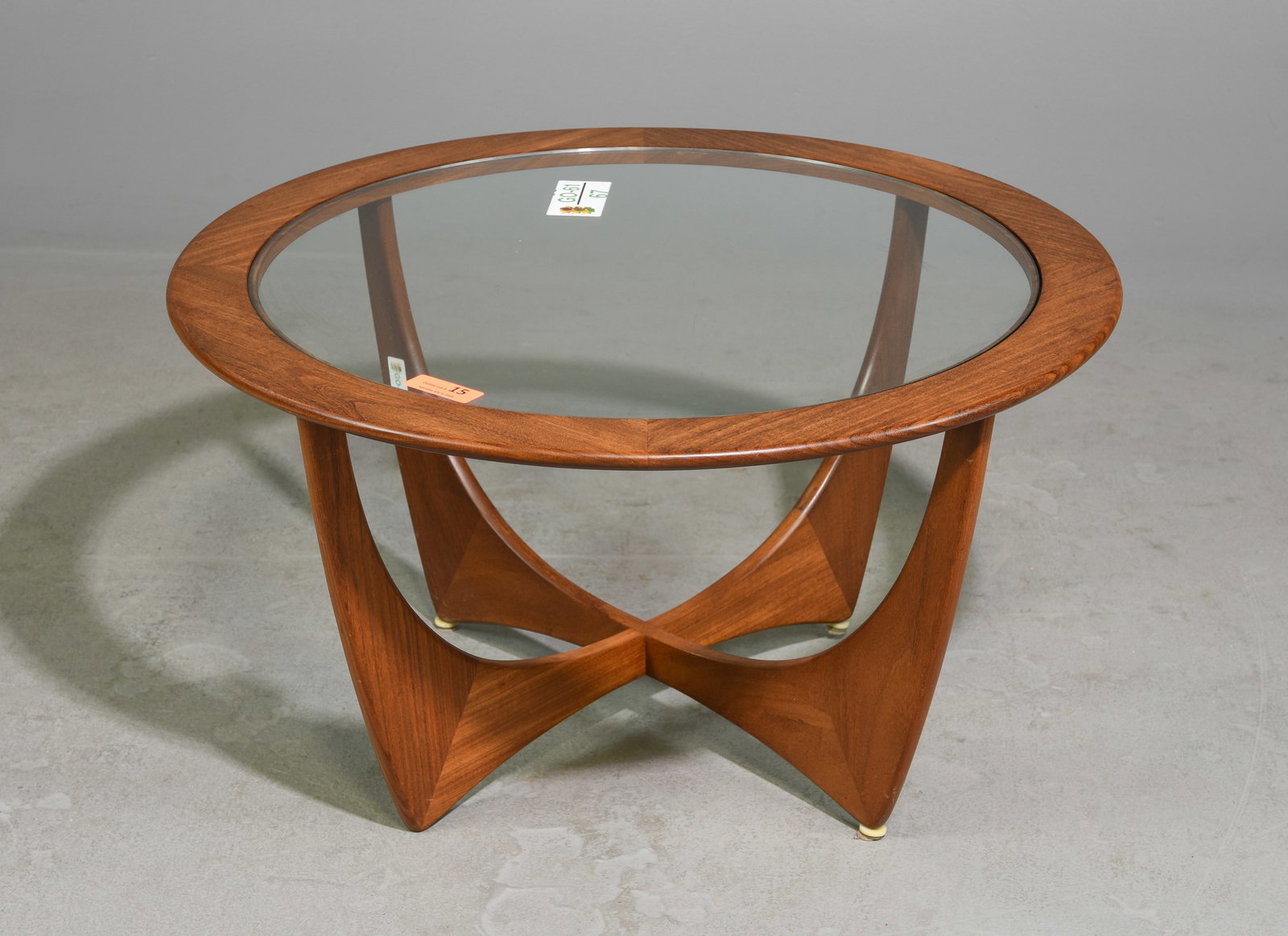 Mid Century Modern G-Plan Round Astro Coffee Table: This Danish Modern Style Teak Coffee Table is made by British Mid Century Modern Furniture Maker G Plan ( GPlan ). - 18.5 in tall x 33 inch diameter