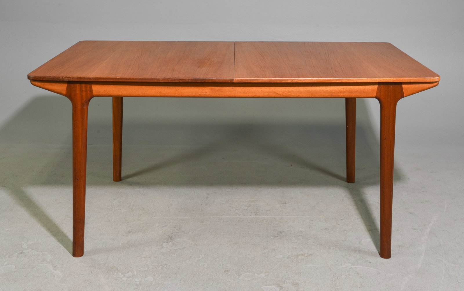 Mid Century Modern Double Leaf Table - McIntosh: Danish Modern Style Teak Double Pop Up Leaf Dining Table by McIntosh - 29 in tall x 63 x 36, Leaves add an additional 15 inches each, Floor to apron is 25.5 inches, Space between the legs is 44.75 inc