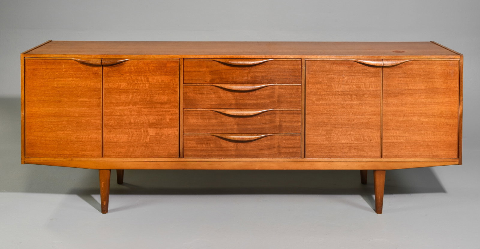 Mid Century Modern Sideboard - Folded Handles: Danish Modern Style Teak Credenza with Folded Handles - Made in England by Sutcliffe , Similar in Style to McIntosh Furniture Sideboards - 31 in tall x 83 x 18