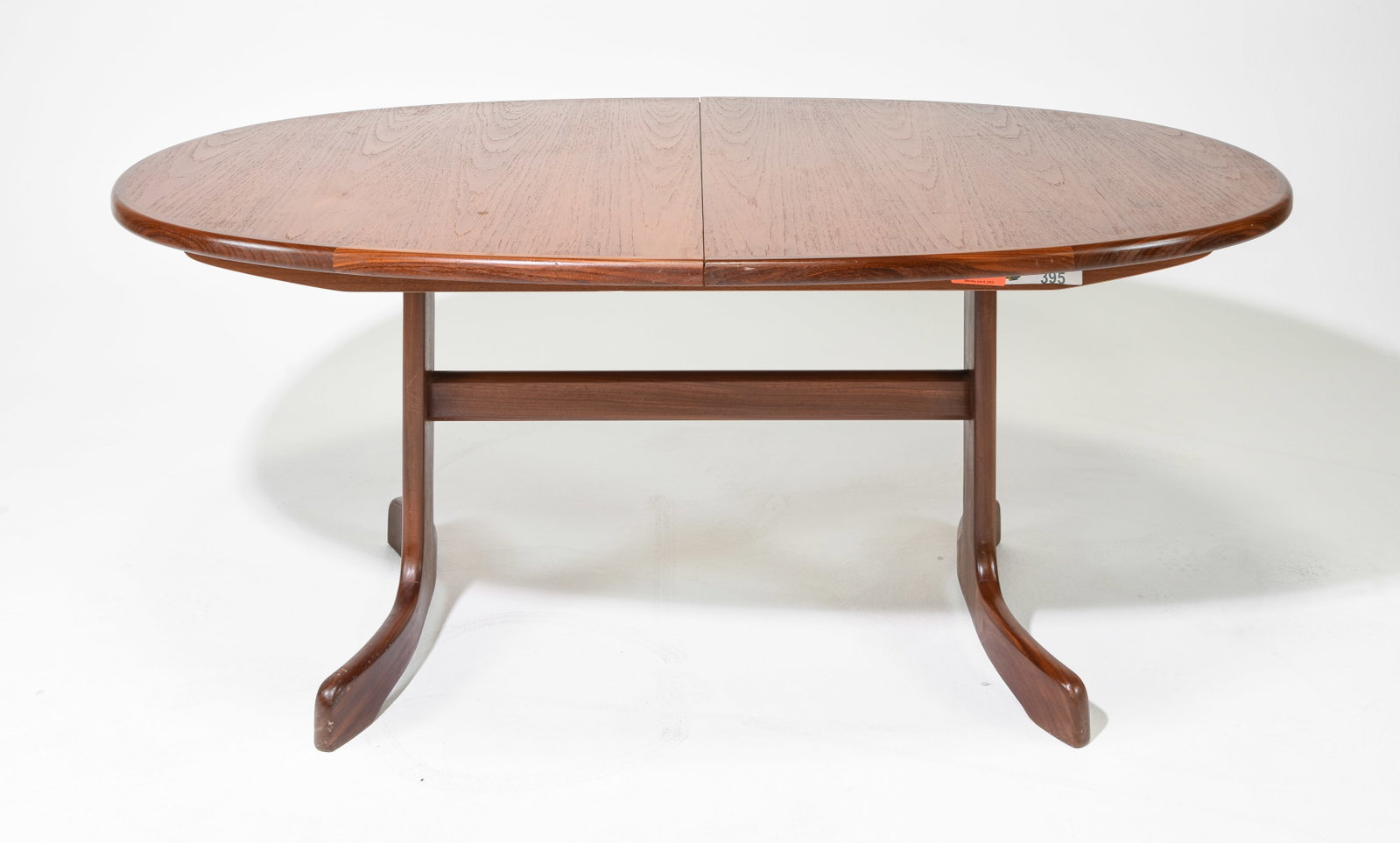 Oval Mid Century Teak Dining Table By G-Plan: This Danish Modern Style Teak Dining Table includes a pop-out butterfly style leaf & is made by Mid Century Modern Furniture Maker G Plan ( GPlan ), part of their fresco range. - 28.75 in tall x 64 x 