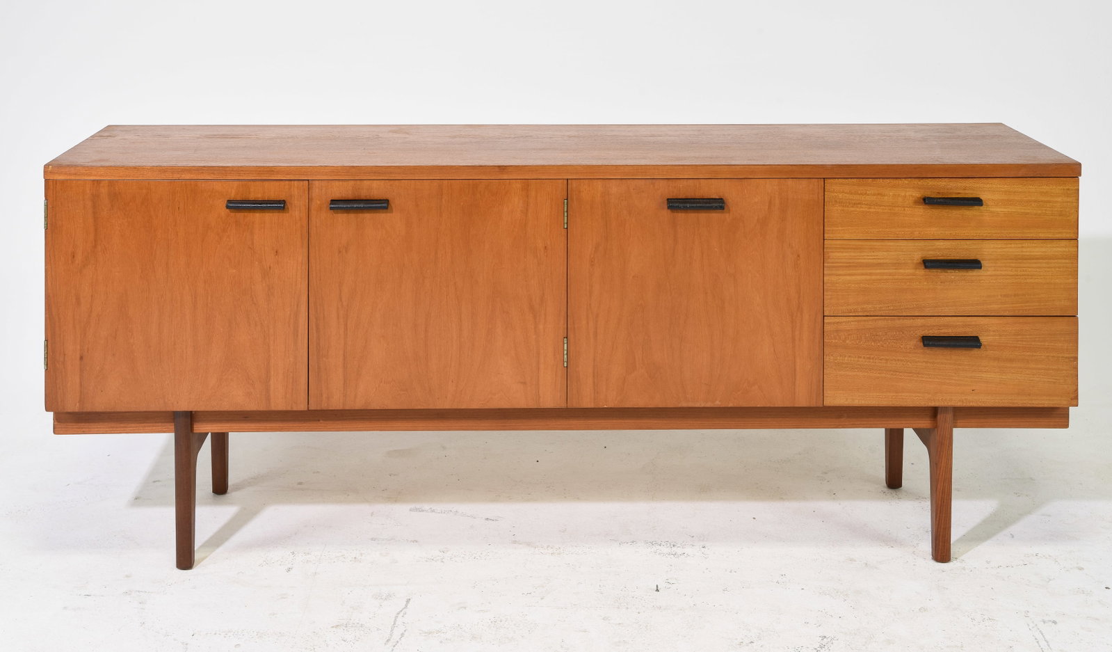 Mid Century Modern Sideboard with Leather Pulls: Danish Modern Style Sideboard with Leather Pulls by Uniflex - 29.5 in tall x 71.5 x 19