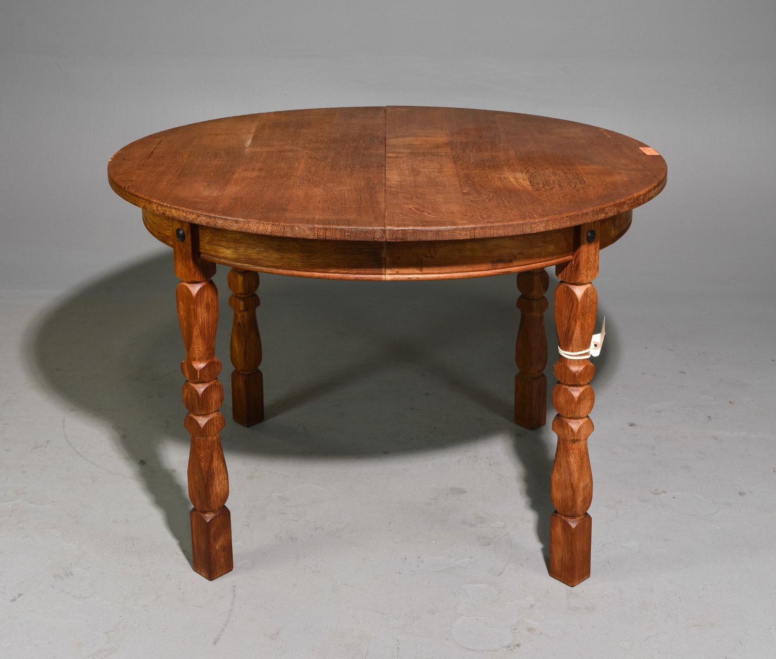 Danish Oak Round Table with Insertable Leaf: Danish Oak Round Table with Insertable Leaf - 29 in tall x 43.5 inch diameter, Leaf adds an additional 20 inches, Floor to apron is 24.25 inches and the space between the legs is 24 inches - Similar i