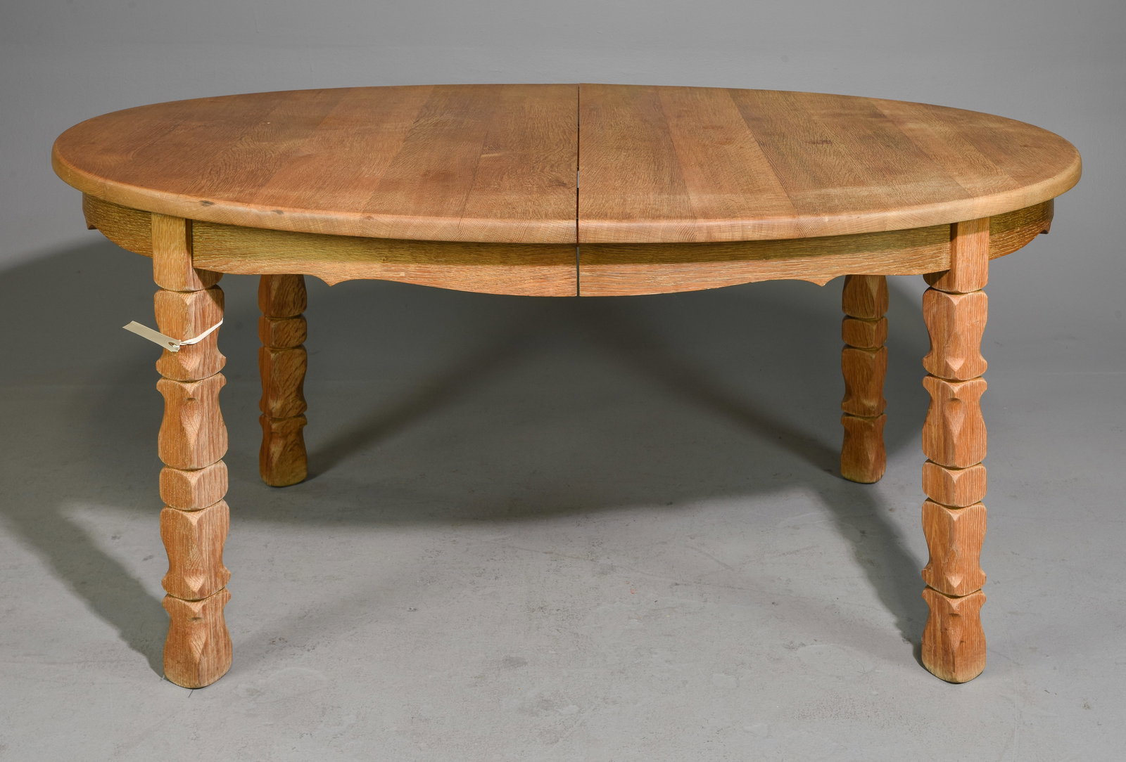 Danish Oak Oval Dining Table with 2 Leaves: Danish Oak Oval Dining Table with 2 Insertable Leaves - 30 in tall x 64.5 x 45.5, Leaves add an additional 20 inches each, Floor to apron is 24.5 inches and the space between the legs is 40 inches - S