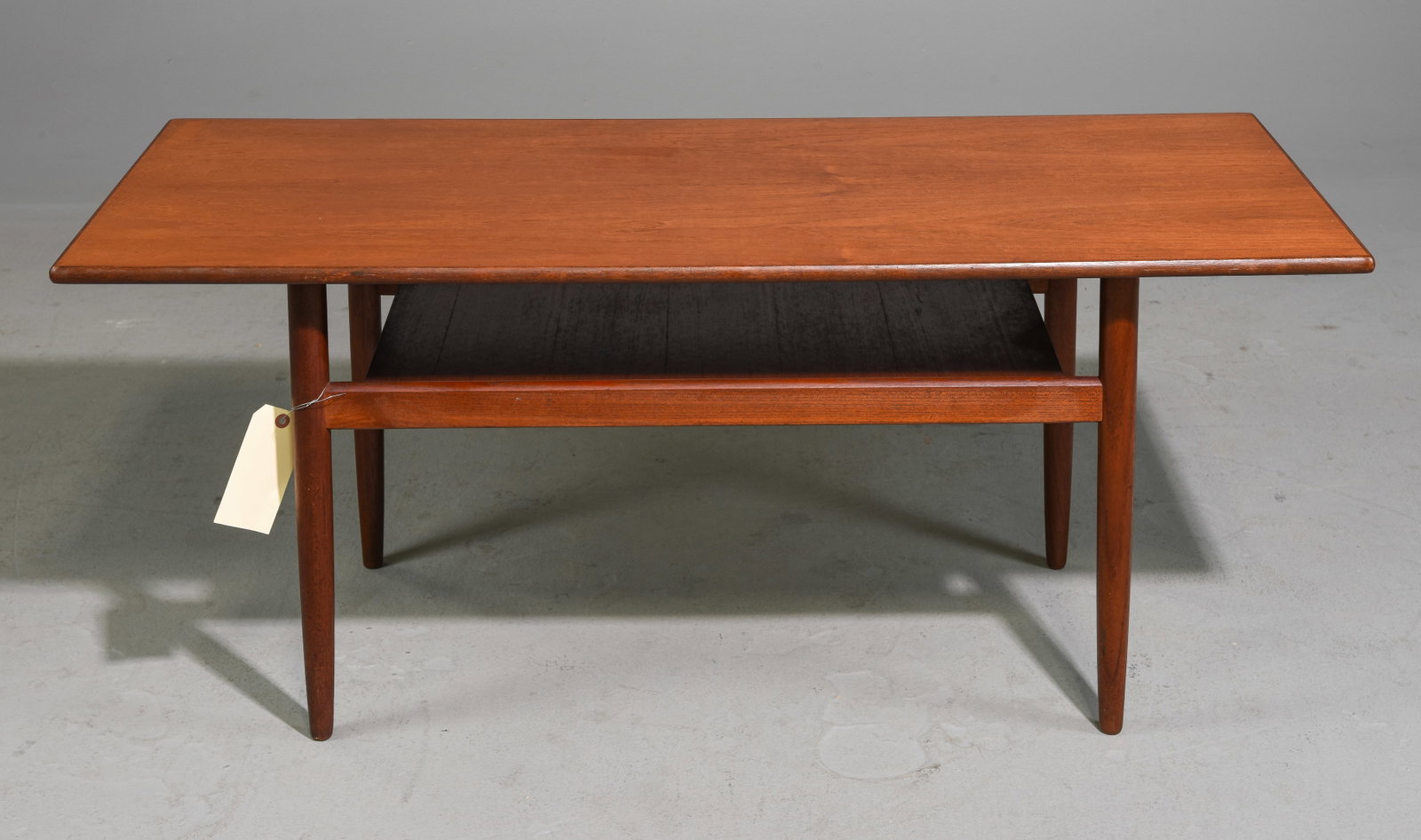 Danish Mid Century Modern Teak Cocktail Table: Danish Mid Century Modern Teak Cocktail / Coffee Table with Magazine Shelf - 20 in tall x 49 x 19.5