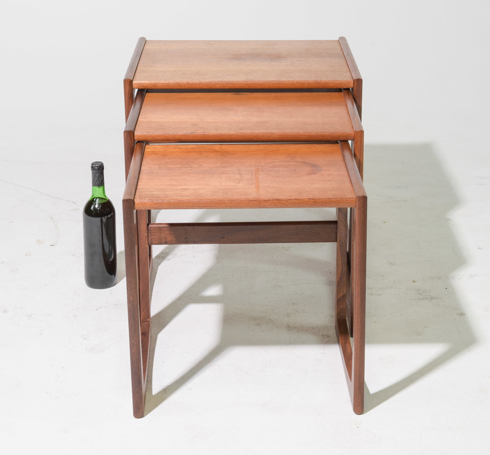 Mid Century Modern Quadrille Nest of 3 Tables: This Danish Modern Style Nest is British and made by Mid Century Modern Furniture Maker G Plan ( Gplan ) it stacks to make a bookcase as well. Measurement for largest table is 19 in tall x 21 wide x 1