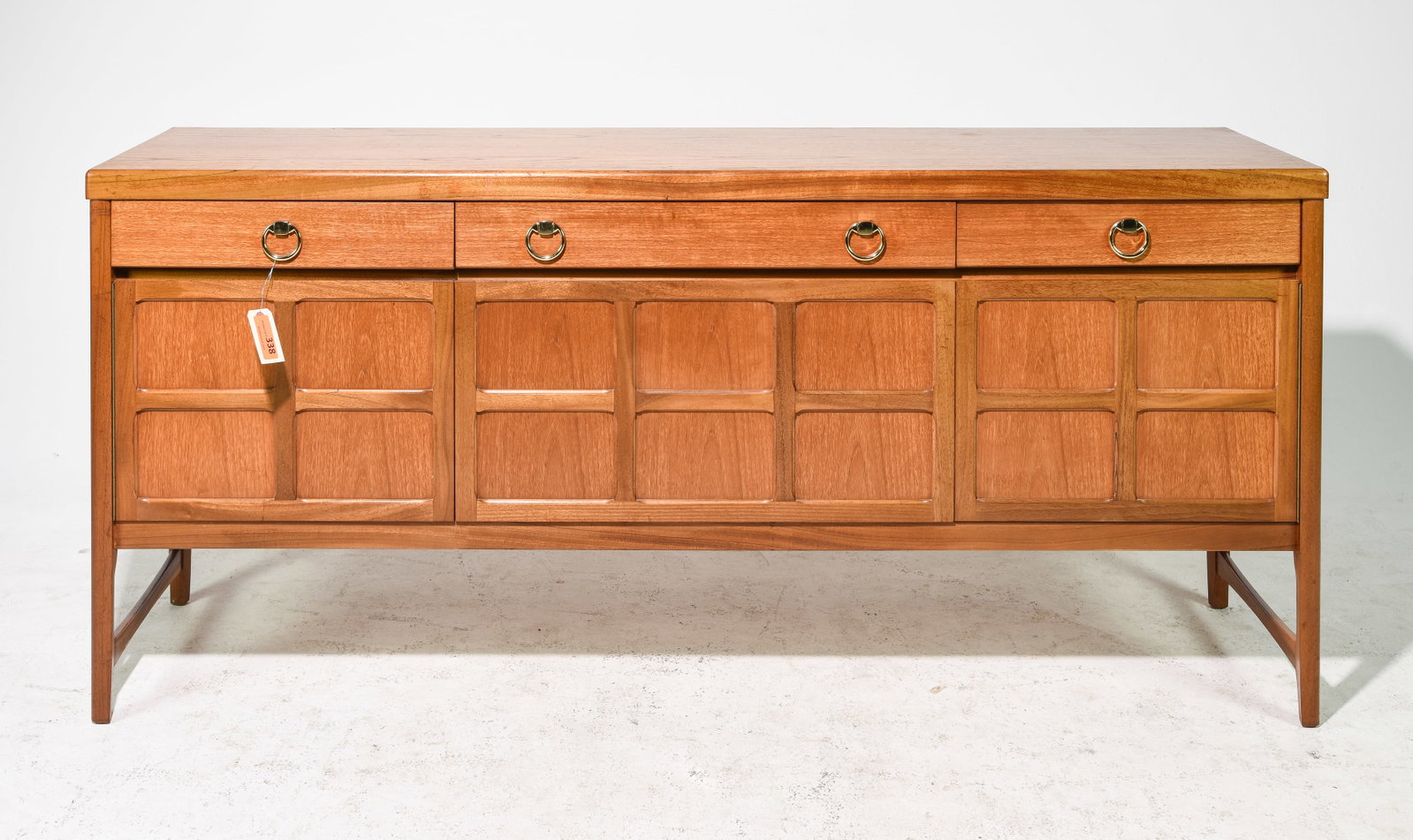 Mid Century Modern Teak Sideboard by Nathan: Danish Modern Style Teak Sideboard with Brass Ring Pulls by Nathan - 33 in tall x 72 x 18