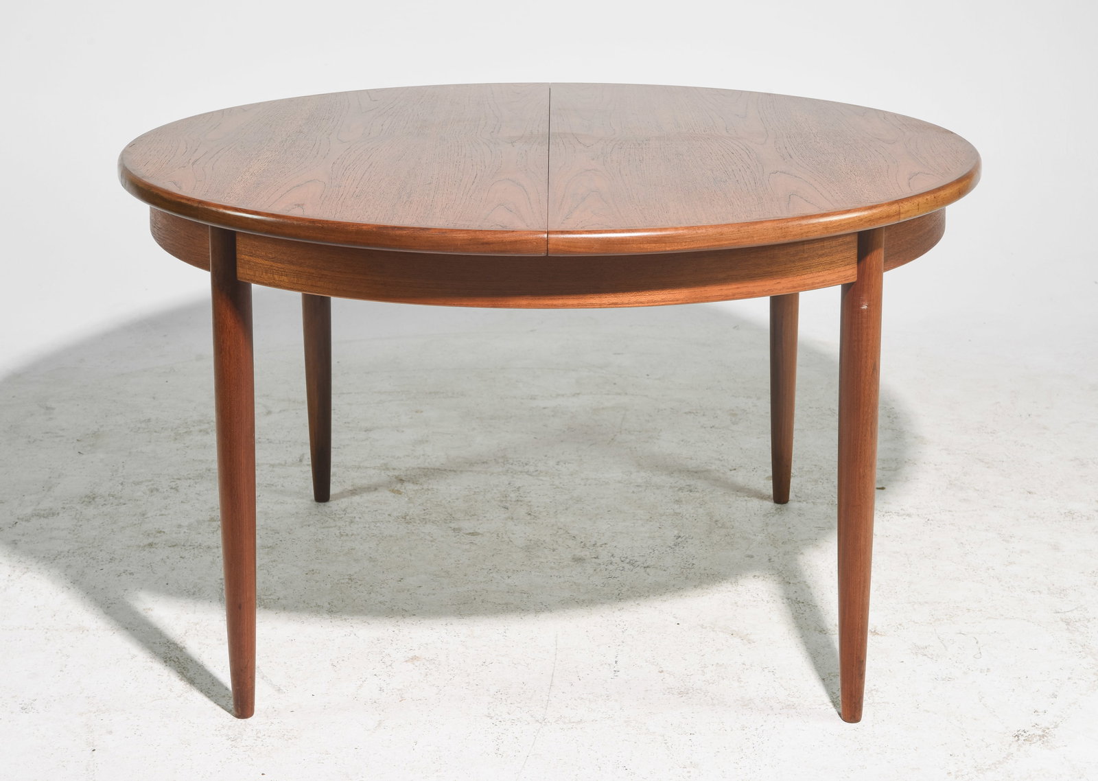 Round Mid Century Table By G-Plan - Pop Up Leaf: This Danish Modern Style Teak Dining Table includes a pop-out butterfly style leaf & is made by Mid Century Modern Furniture Maker G Plan ( GPlan ) - Part of their Fresco Range. - 29 in tall x 48 inch