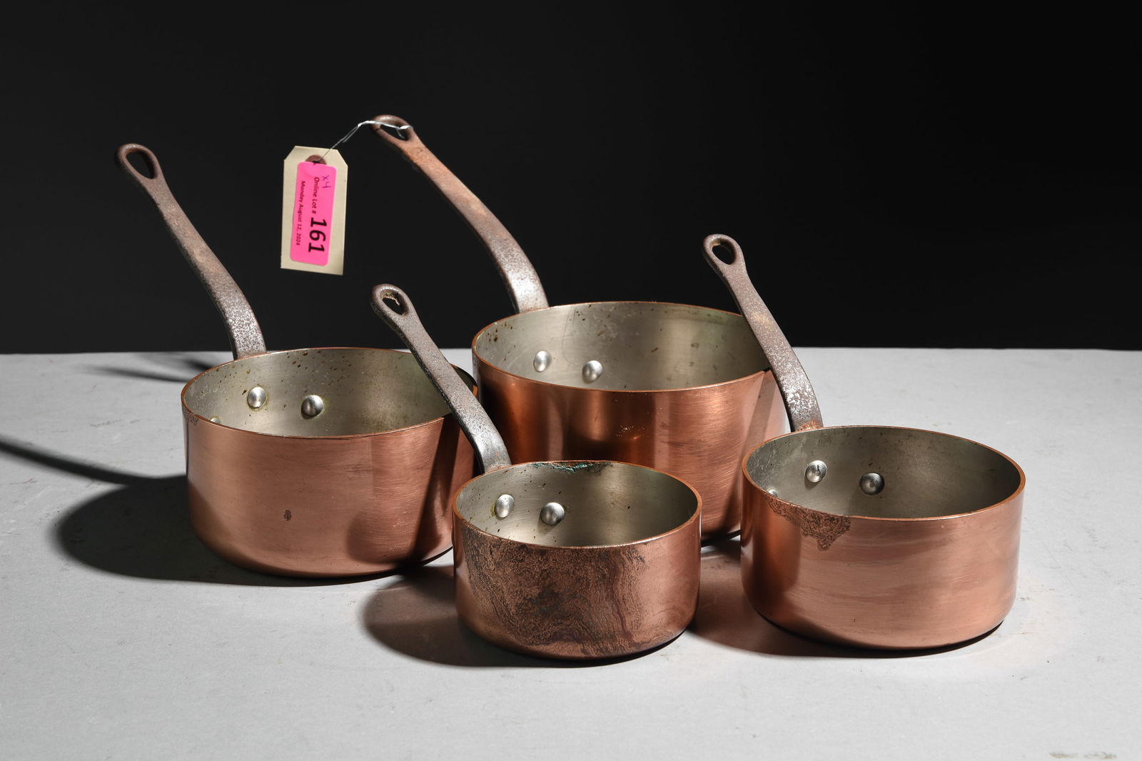 Set of 4 French Polished Copper Sauce Pans: Set of 4 French Polished Copper Sauce Pans - Largest is 7.5 in tall x 15 x 7.5 - Reminder, measurements are meant for shipping purposes