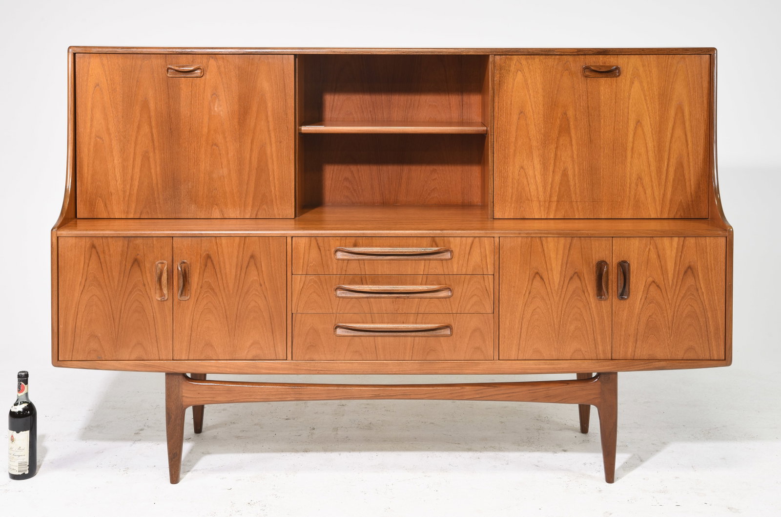 Mid Century Teak Cocktail Cabinet - Gplan - Fresco #1: This Danish Modern Style hutch / high board is British and made by Mid Century Modern Furniture Maker G Plan ( Gplan ) & is part of their "Fresco" Range. It has a drop down section and open stretcher 