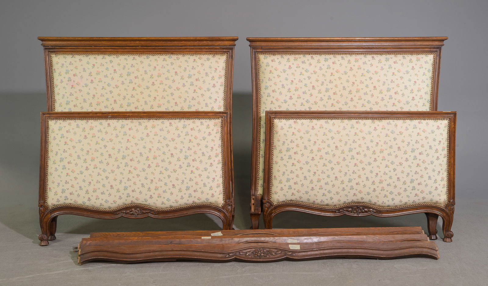 2 French "Twin" Upholstered Beds with Rails: 2 French "Twin" Upholstered Beds with Rails - Headboards are 46 in tall x 44.5 x 3 each, Rails are 73.5 inches long each - This bed is a European size which can usually be converted to an American siz