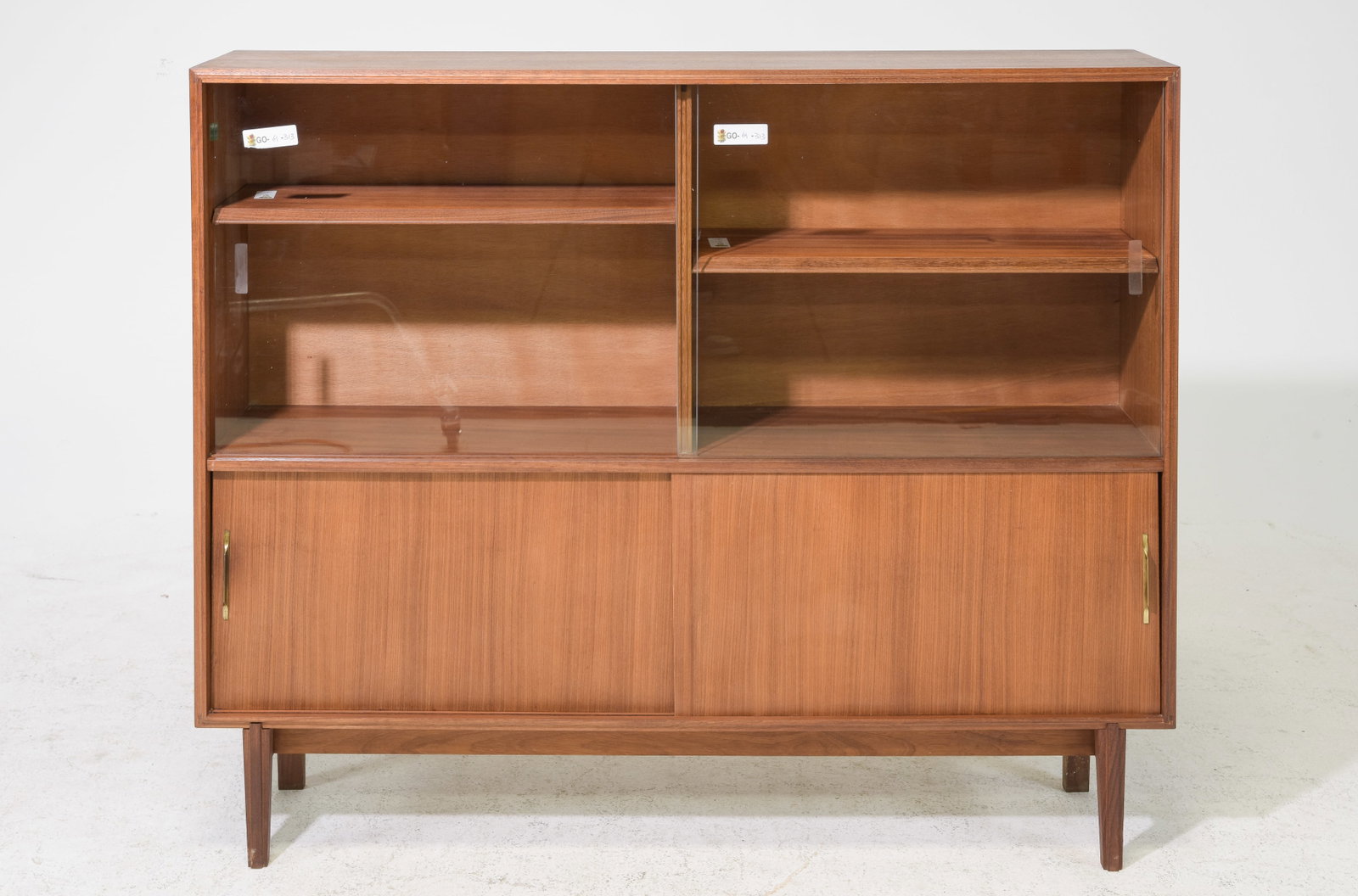 Mid Century Modern Bookcase - Beaver & Tapley: Danish Modern Style Sliding Door Bookcase by Beaver & Tapley - 40.25 in tall x 48 x 11