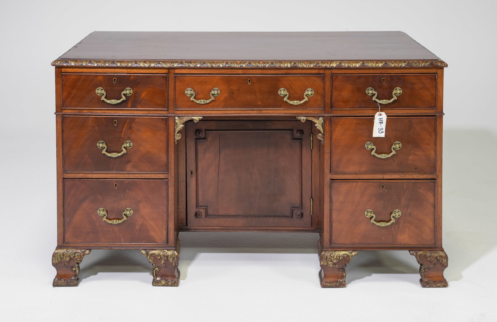 American Mahogany Desk with Gold Accent: American Mahogany Desk with Gold Accent - 30 in tall x 50 x 25, Kneehole is 22 inches