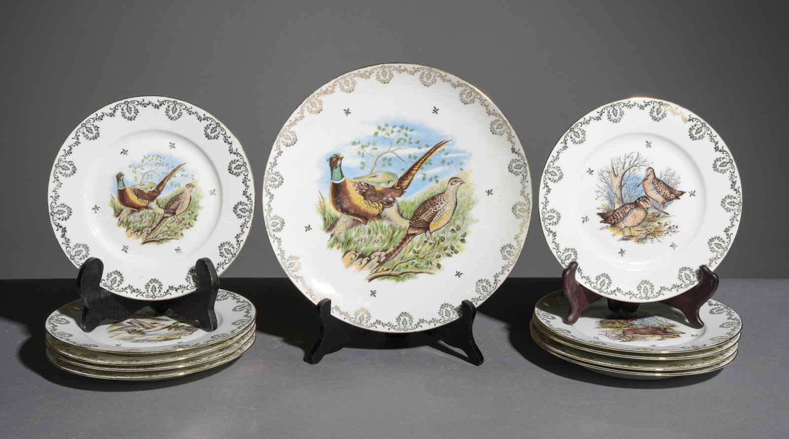 11pc French Hunt / Pheasant Plate Set: 11pc French Hunt / Pheasant Plate Set - Platter & 10 Plates - Platter is 1.5 in tall x 12 inch diameter, Plates are 1 in tall x 9 inch diameter
