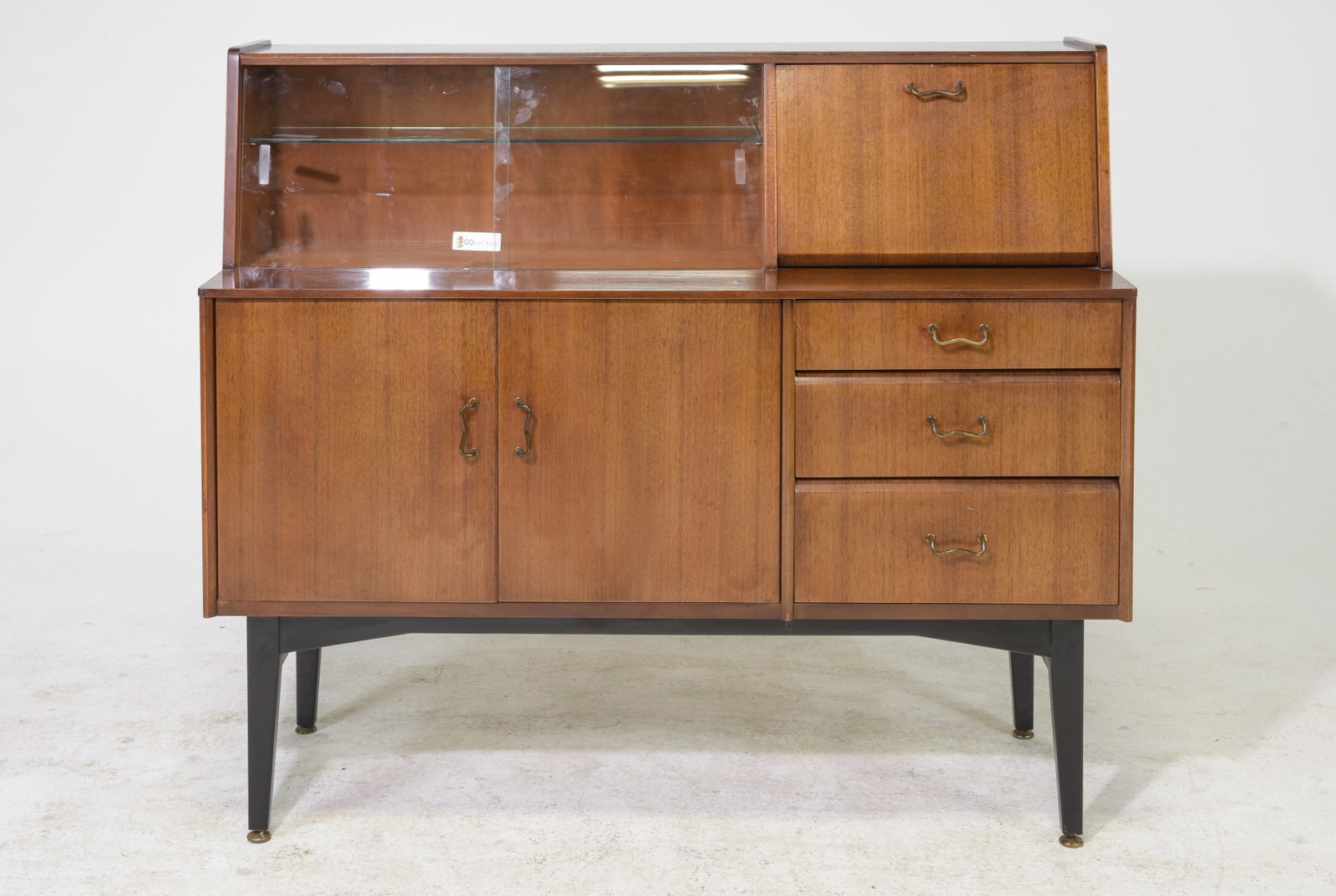 Mid Century Modern High board - Nathan: This Danish Modern Style hutch / cocktail cabinet is from England, likely by Nathan Furniture co. - 42 inches tall x 48 x 18