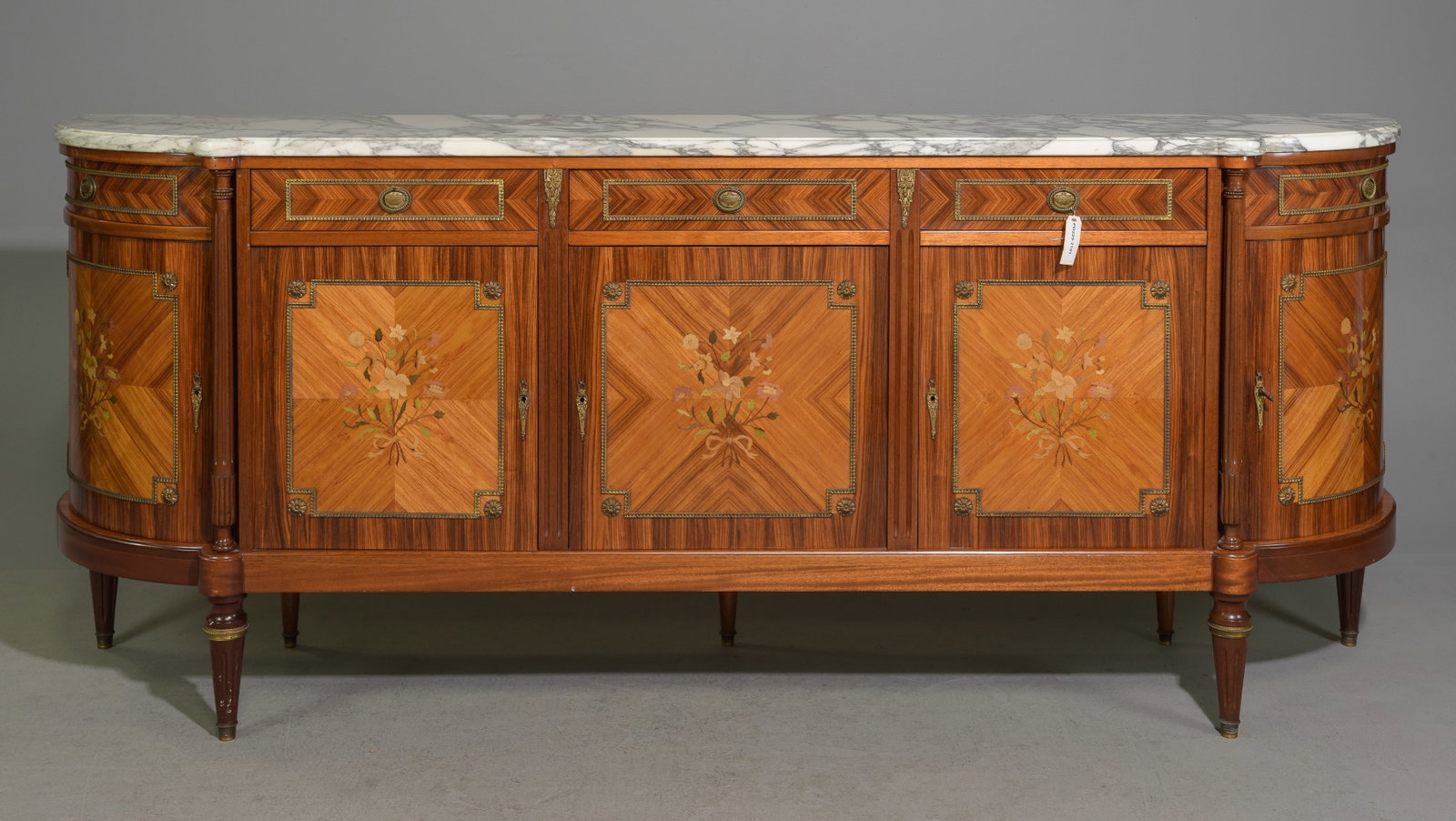Louis XVI Style White Marble Top Inlaid Sideboard: French Louis XVI Style White Marble Top Marquetry Inlaid Sideboard / Enfilade with Gilded Ormolu Accents and Curved Sides c.1940's-50's - 41 in tall x 99 x 22