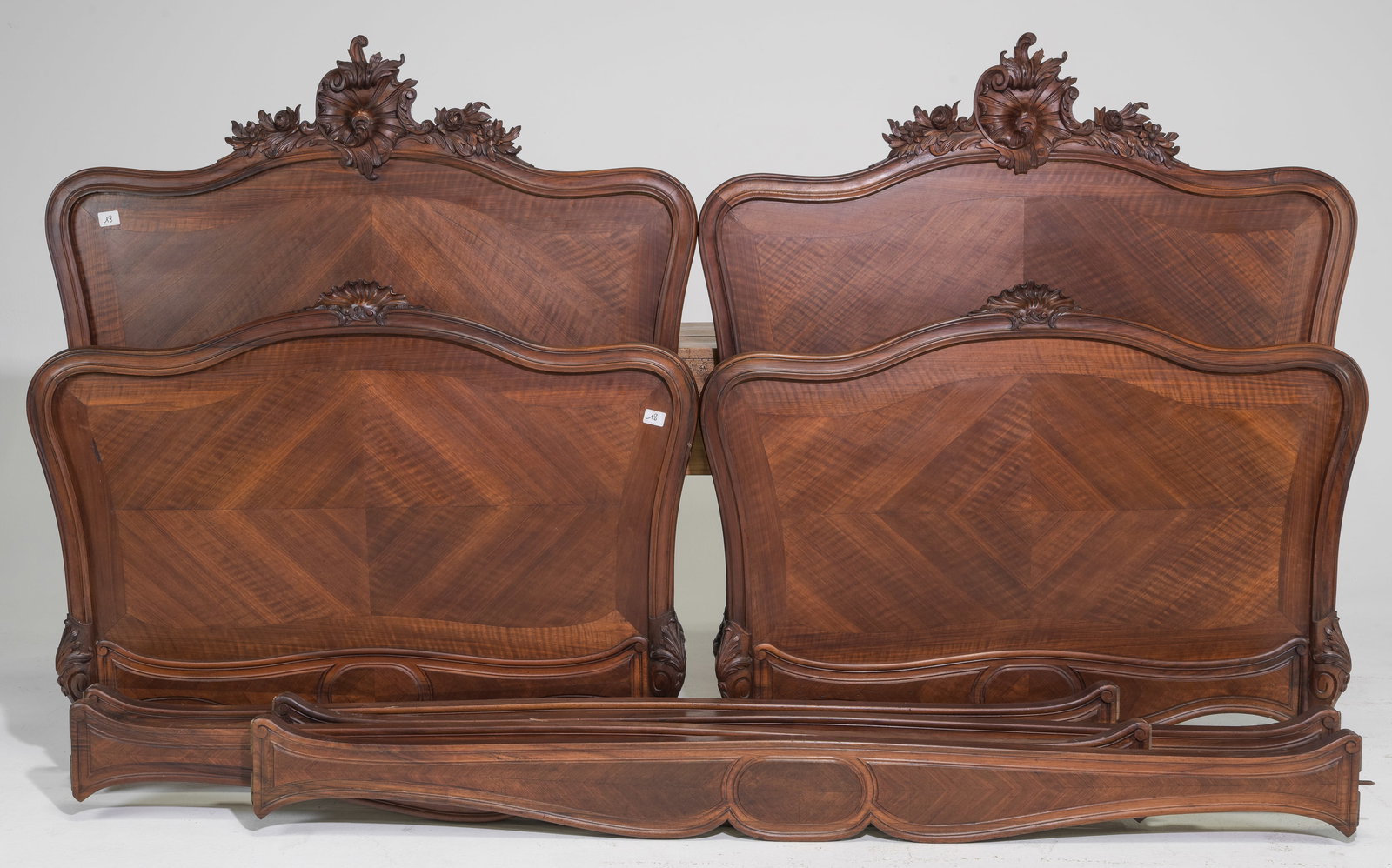Louis XV Style Pair of Walnut "Twin" Beds with Rails: French Louis XV Style Pair of Walnut "Twin" Beds with Rails c.1920's-30's - Headboards are 55 in tall x 47 x 3 each, Rails are 75 inches long each with one bolt on each end - This bed is a European si