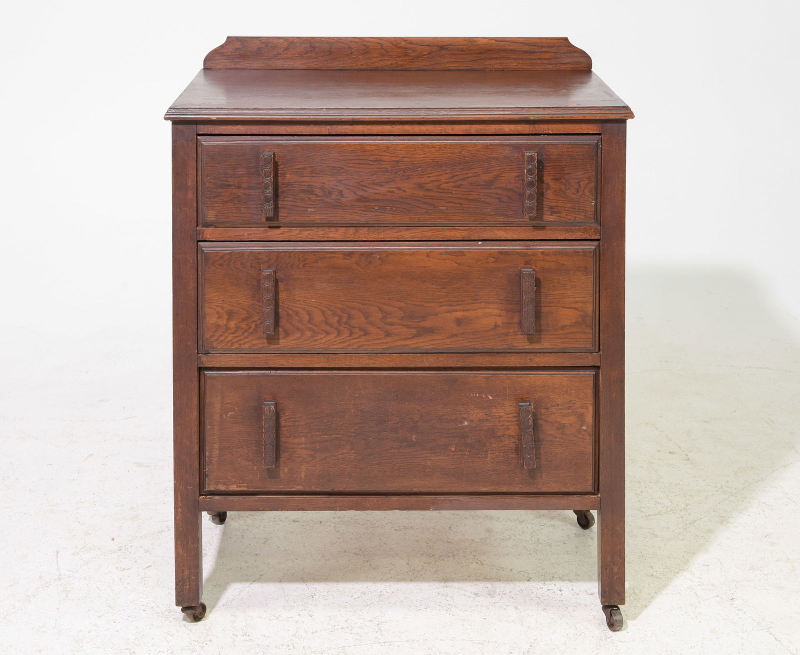 British Oak Three Drawer Chest on Casters (1 of 5)