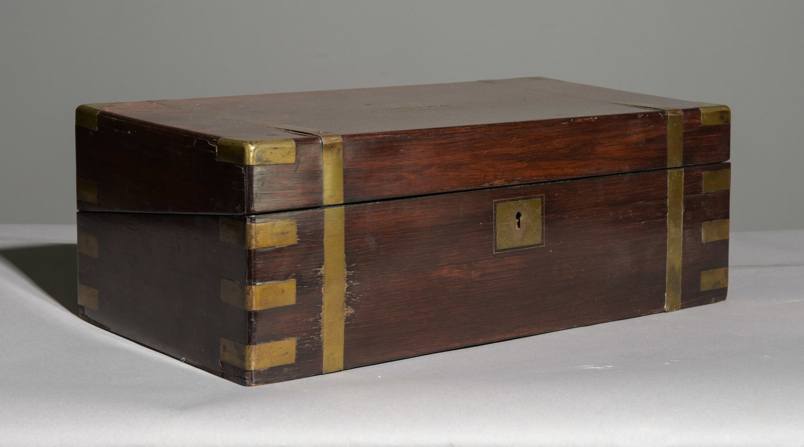 English Mahogany Brass Banded Writing Slope: English Mahogany Brass Banded Writing Slope c.1890's-1920's - H.J. Wilkinson - 7.25 in tall x 19.75 x 10.5 when closed