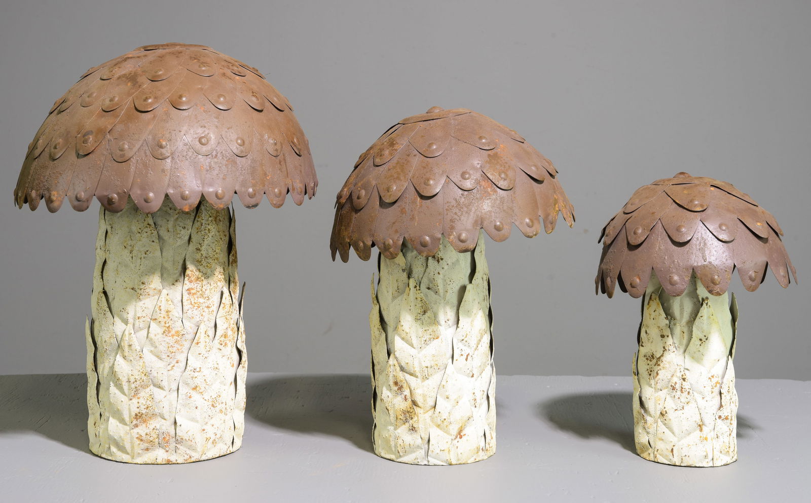 Three Graduated Metal Mushrooms (1 of 4)