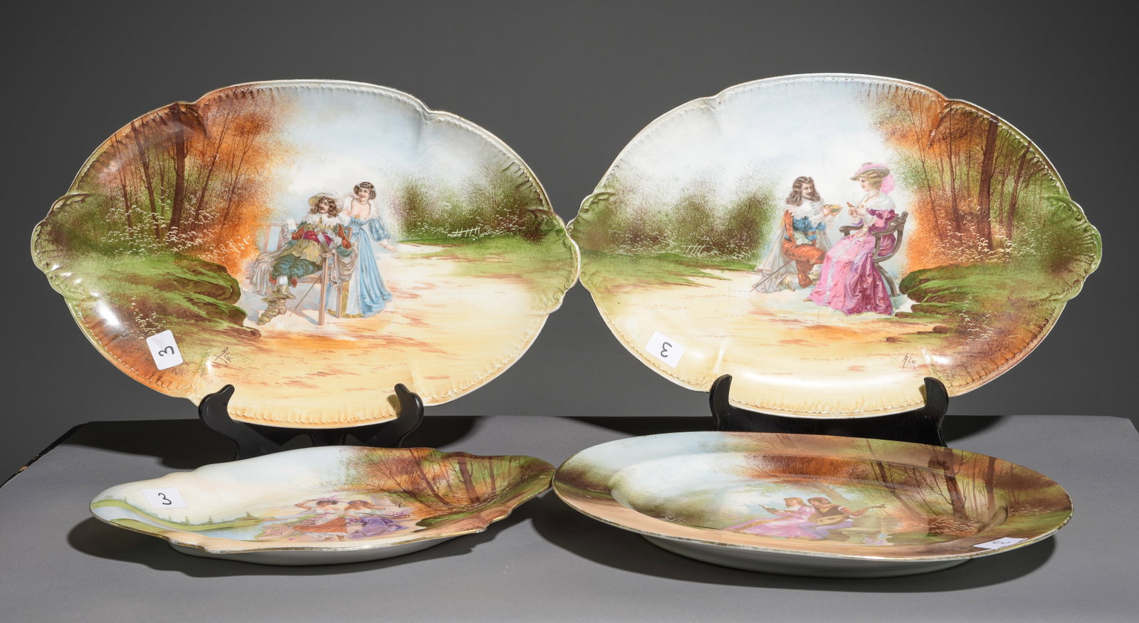 Four Assorted Romantic Scene Hand Painted Platters: Four Assorted Romantic Scene Hand Painted Platters - Largest is 2 in tall x 22 x 14