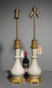 Pair of Gilded Bronze Fitted Porcelain Lamps