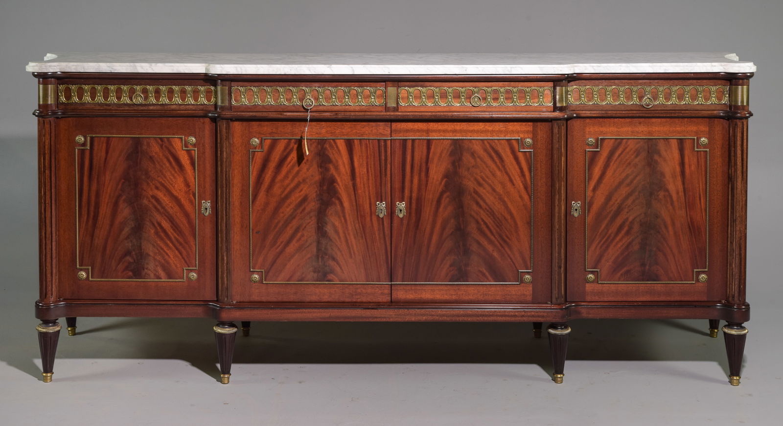 Louis XVI Style White Marble Top Shapley Sideboard: French Louis XVI Style White Marble Top Shapley Mahogany Sideboard / Enfilade with Gilded Ormolu Adornments c.1940's-50's - 50 in tall x 98.5 x 23 - This is 8.2 feet long