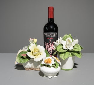 Three Floral Decorative Porcelain Figures